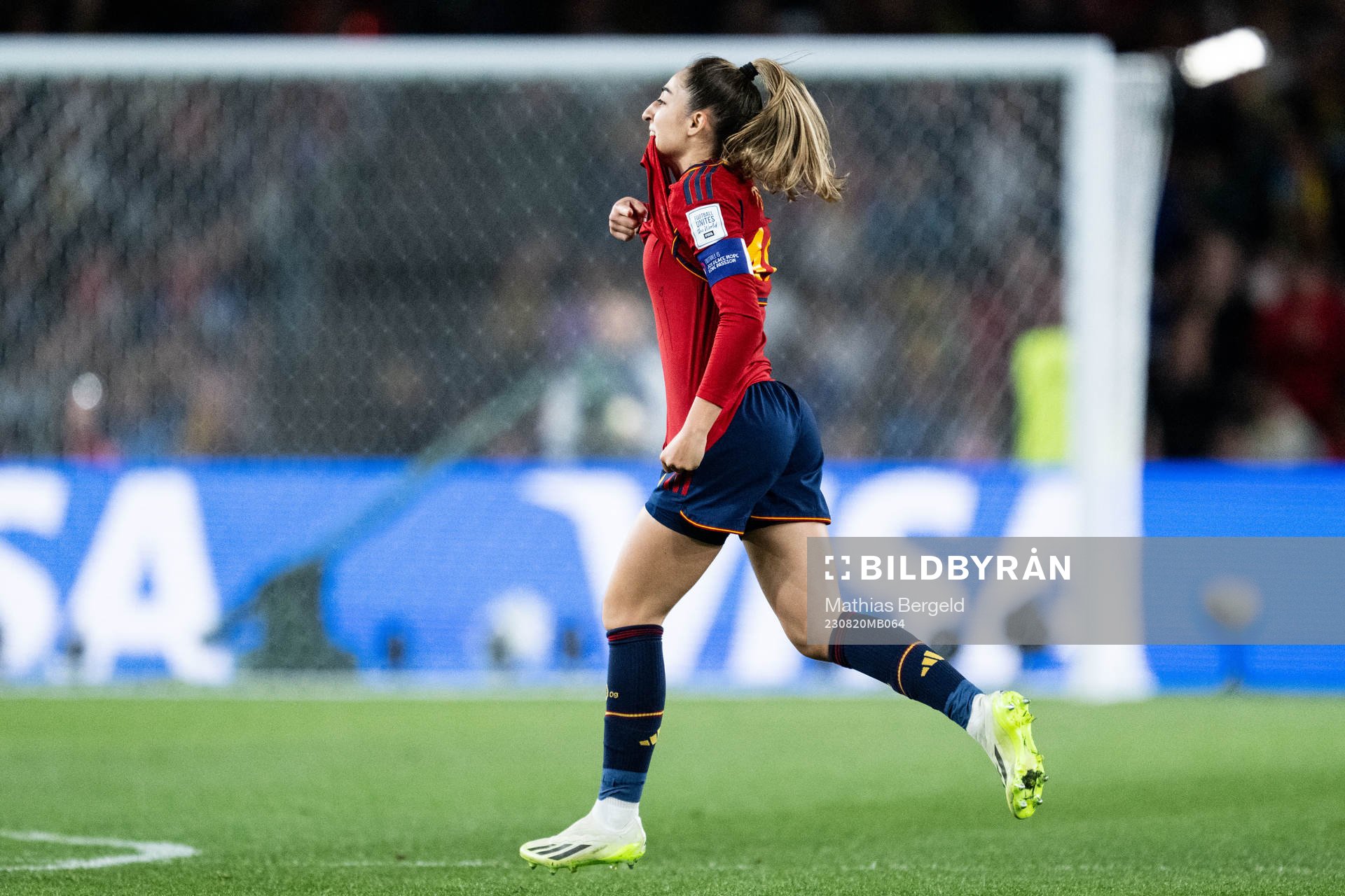 Olga Carmona of Spain celebrates