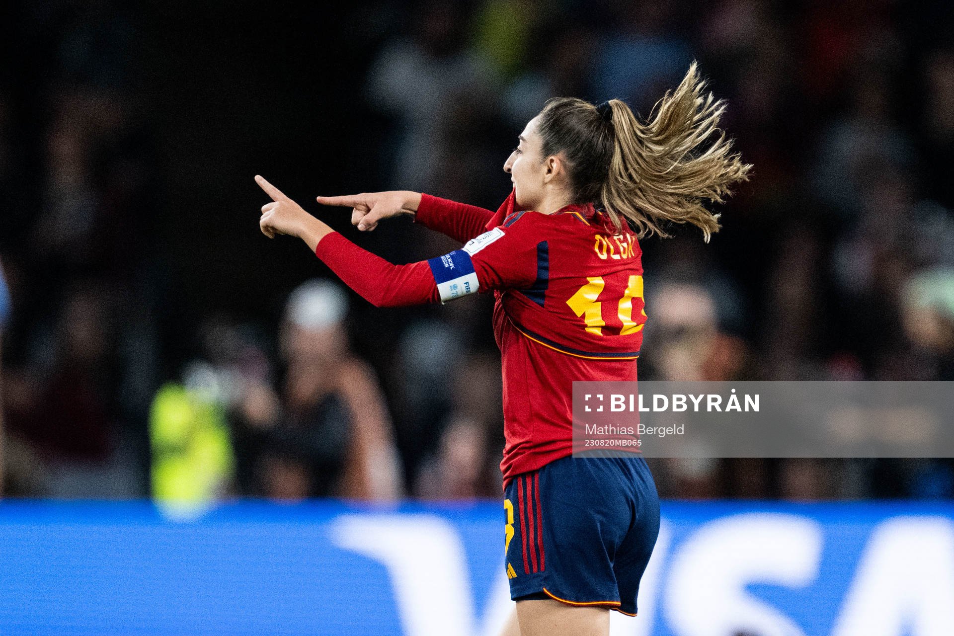 Olga Carmona of Spain celebrates