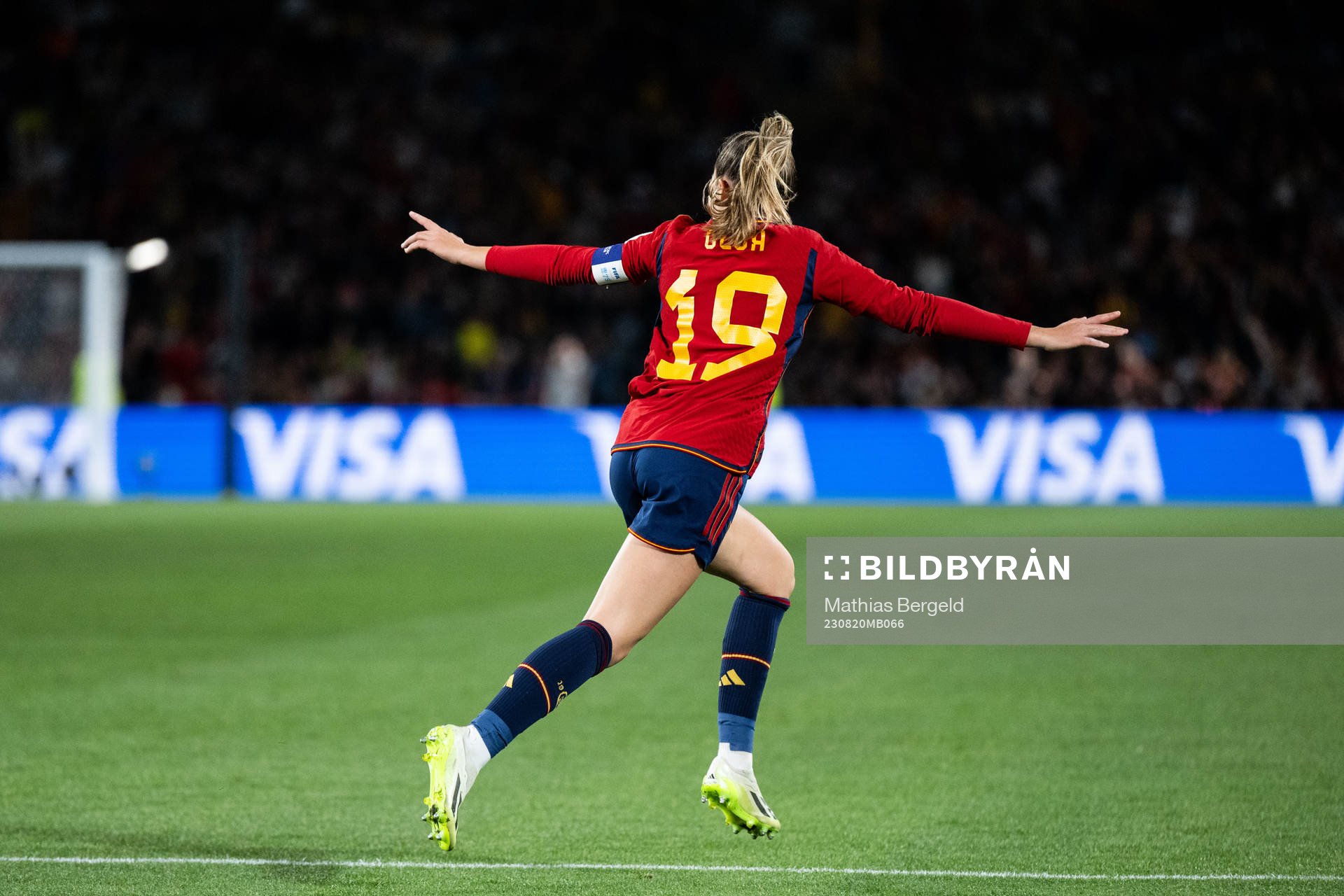 Olga Carmona of Spain celebrates