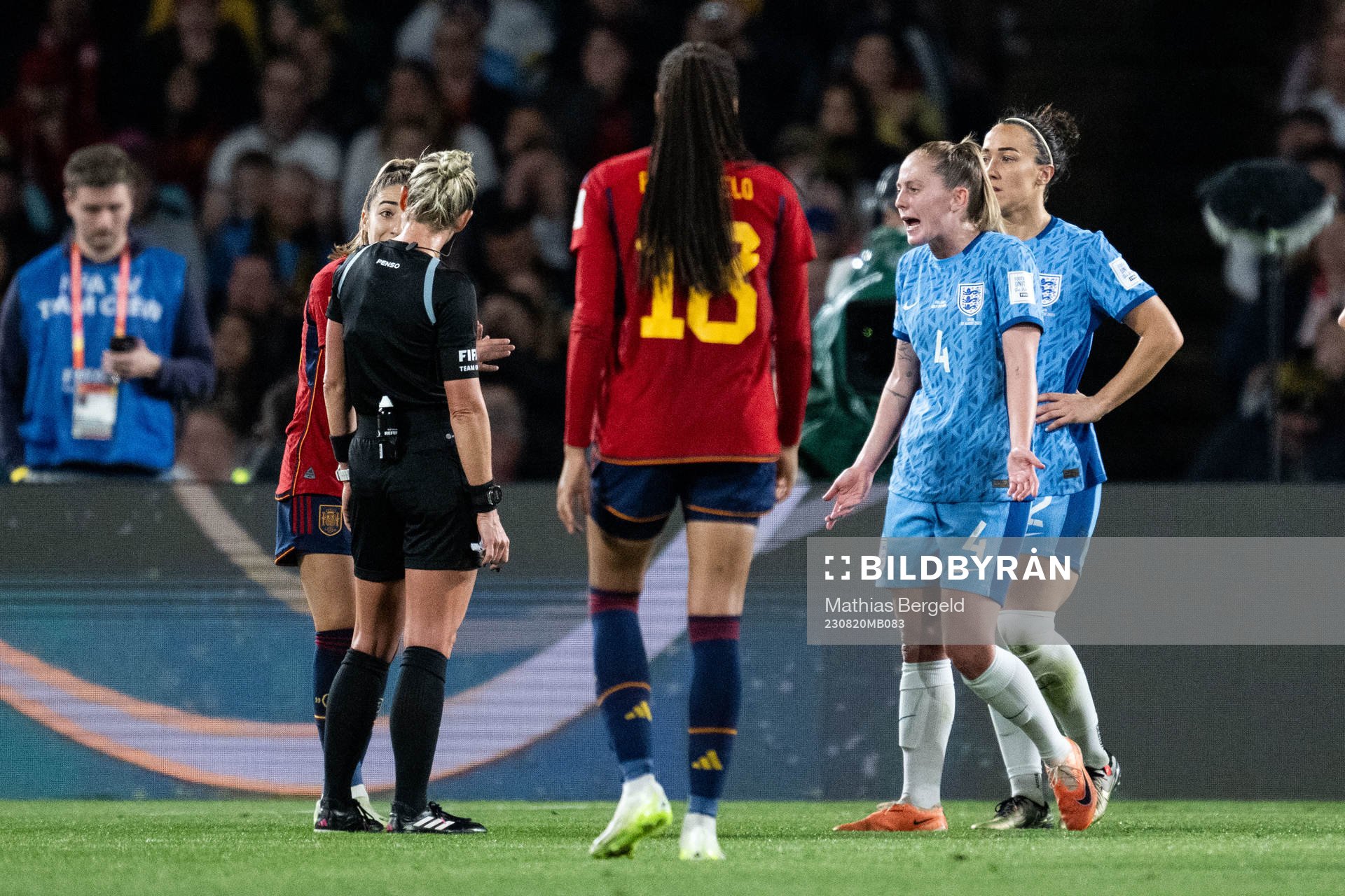 Keira Walsh of England reacts against referee Tori Penso