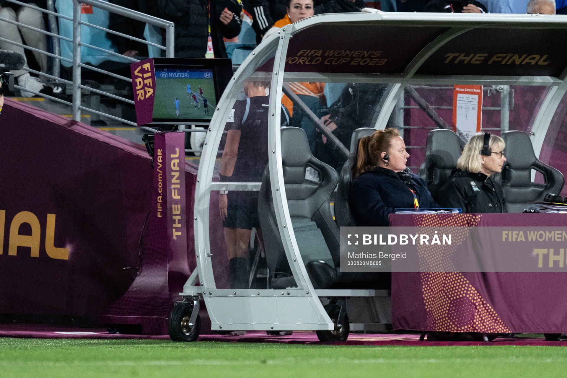 Referee Tori Penso checks the VAR screen for possible
