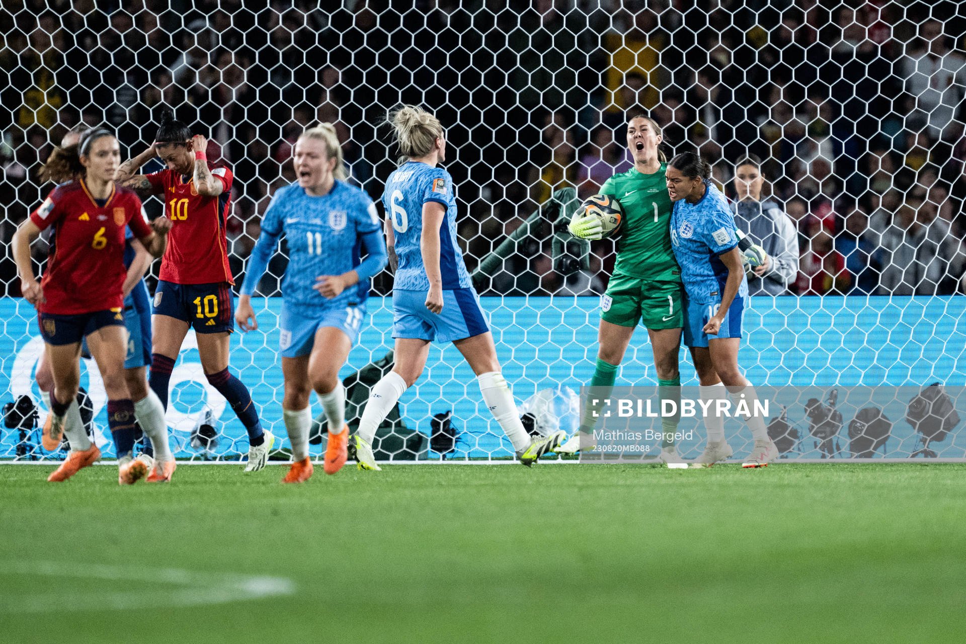 Goalkeeper Mary Earps of England celebrates with Jessica Carter after saved penalty during the FIFA Women's World Cup final between Spain and England on August 20, 2023 in Sydney.