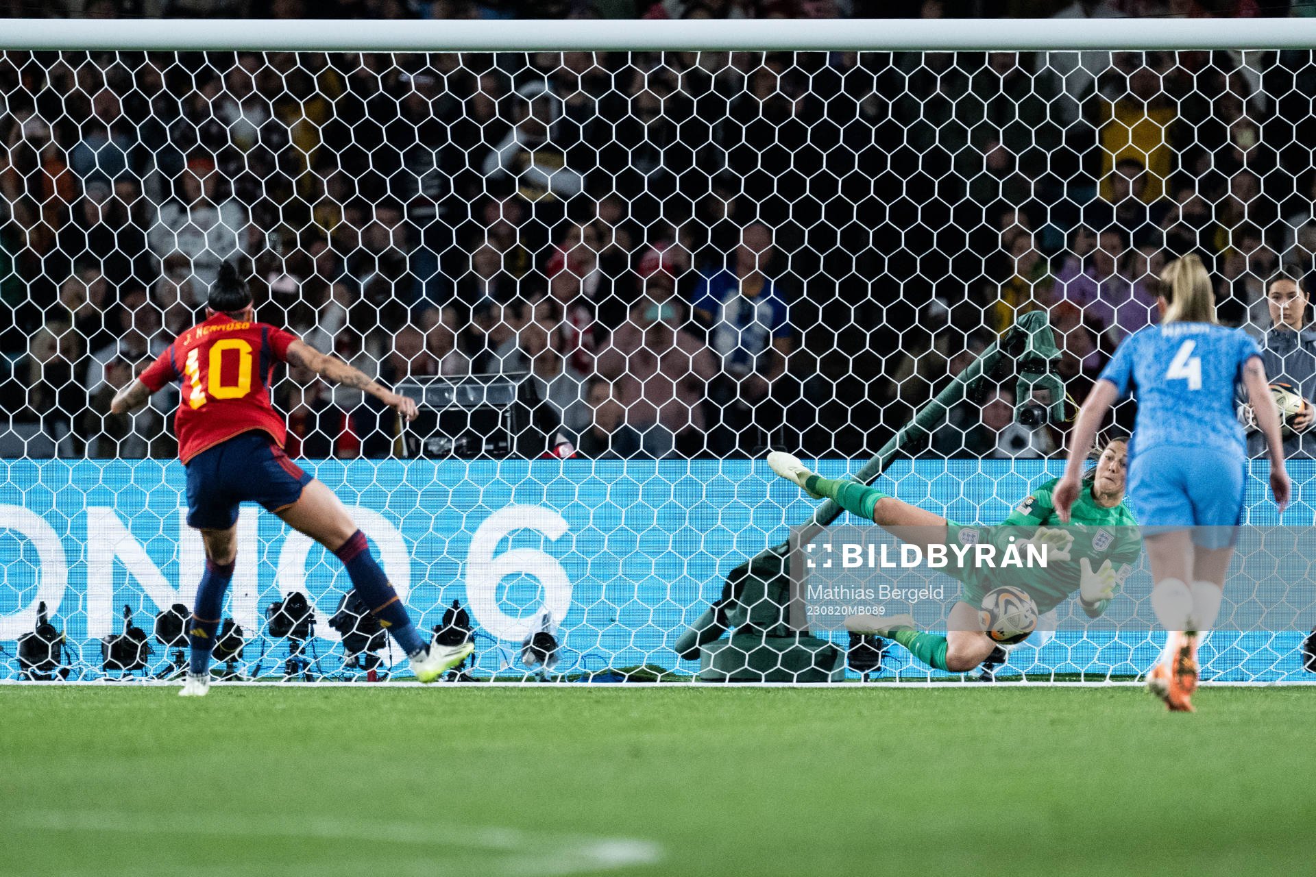 Goalkeeper Mary Earps of England saves penalty by Jennifer