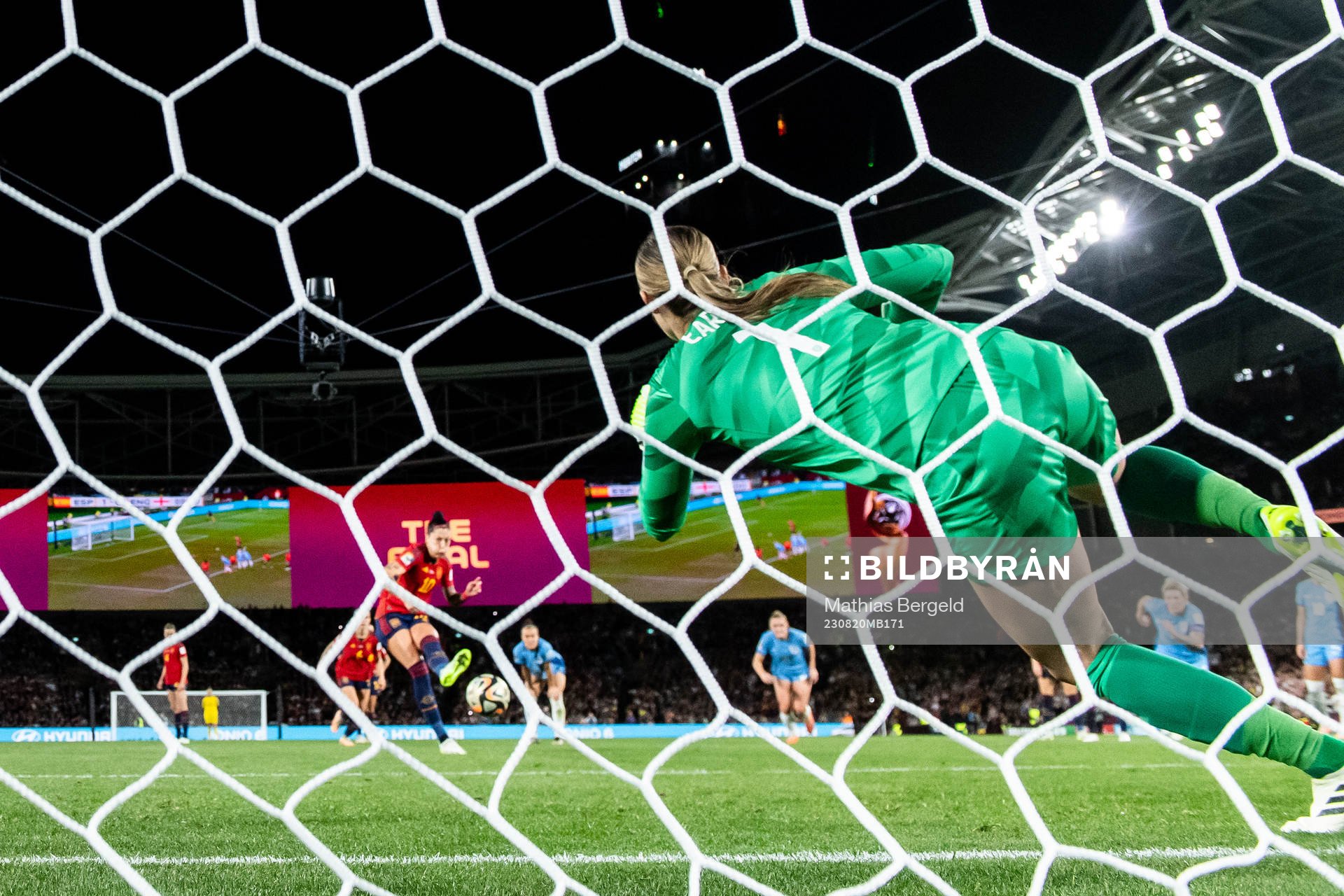 Goalkeeper Mary Earps of England saves a penalty from