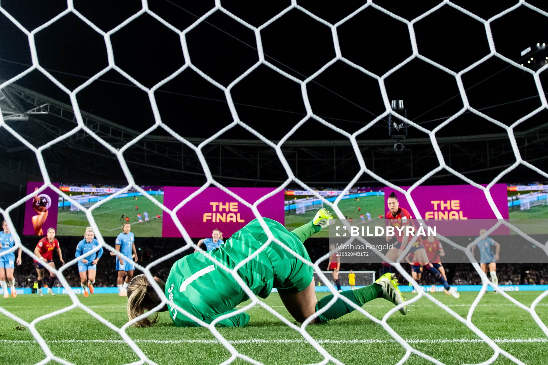 Goalkeeper Mary Earps of England saves a penalty from