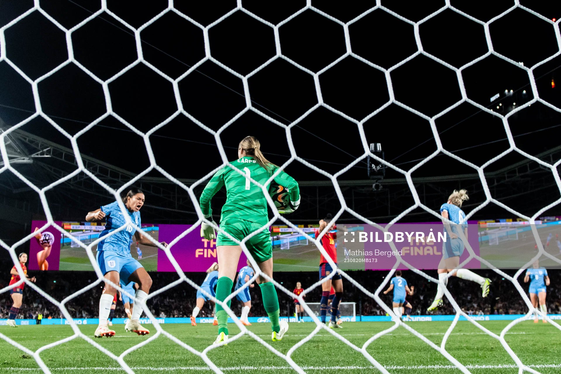Goalkeeper Mary Earps of England saves a penalty from