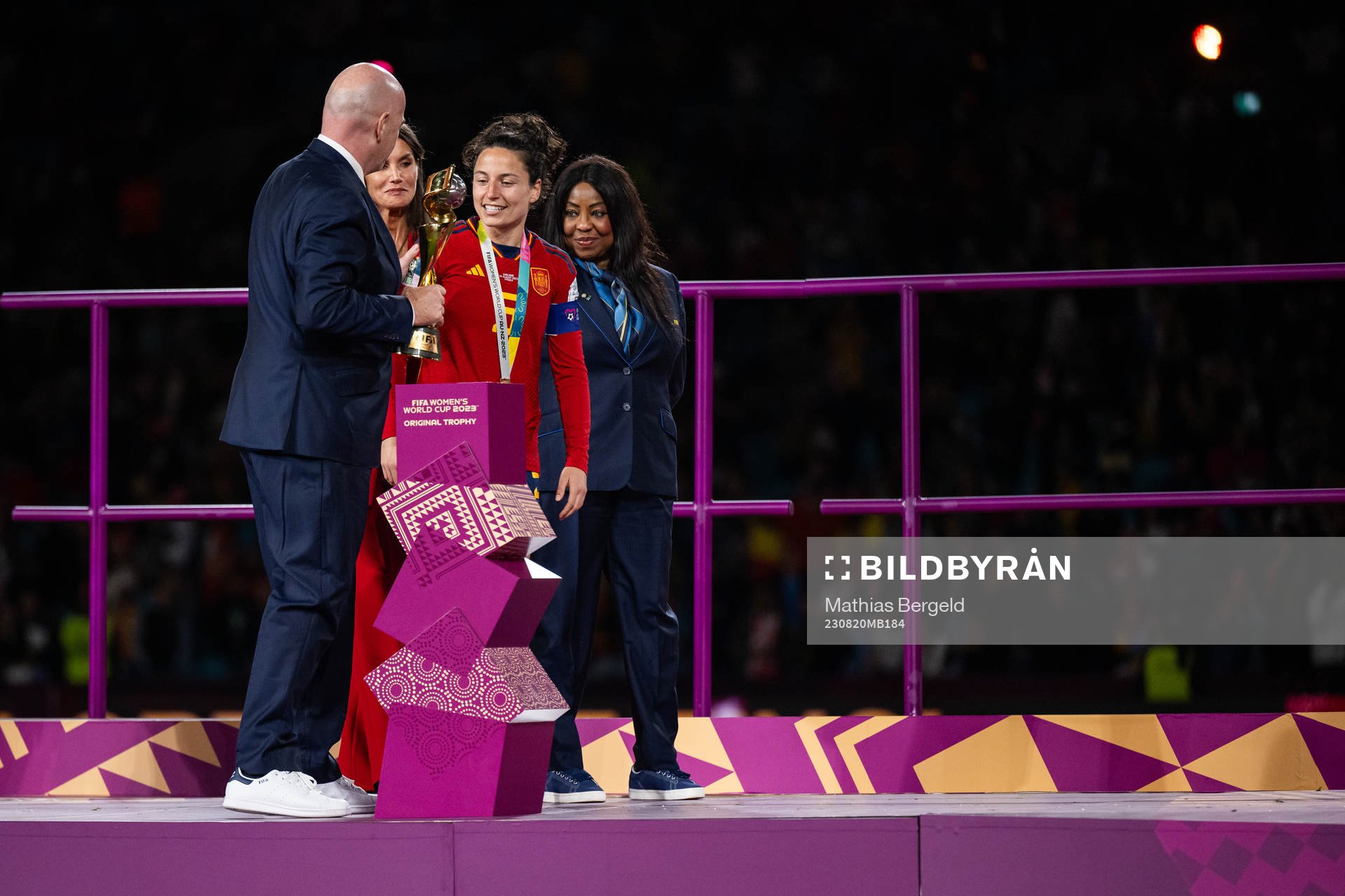 FIFA president Gianni Infantino hands the trophy to Ivana