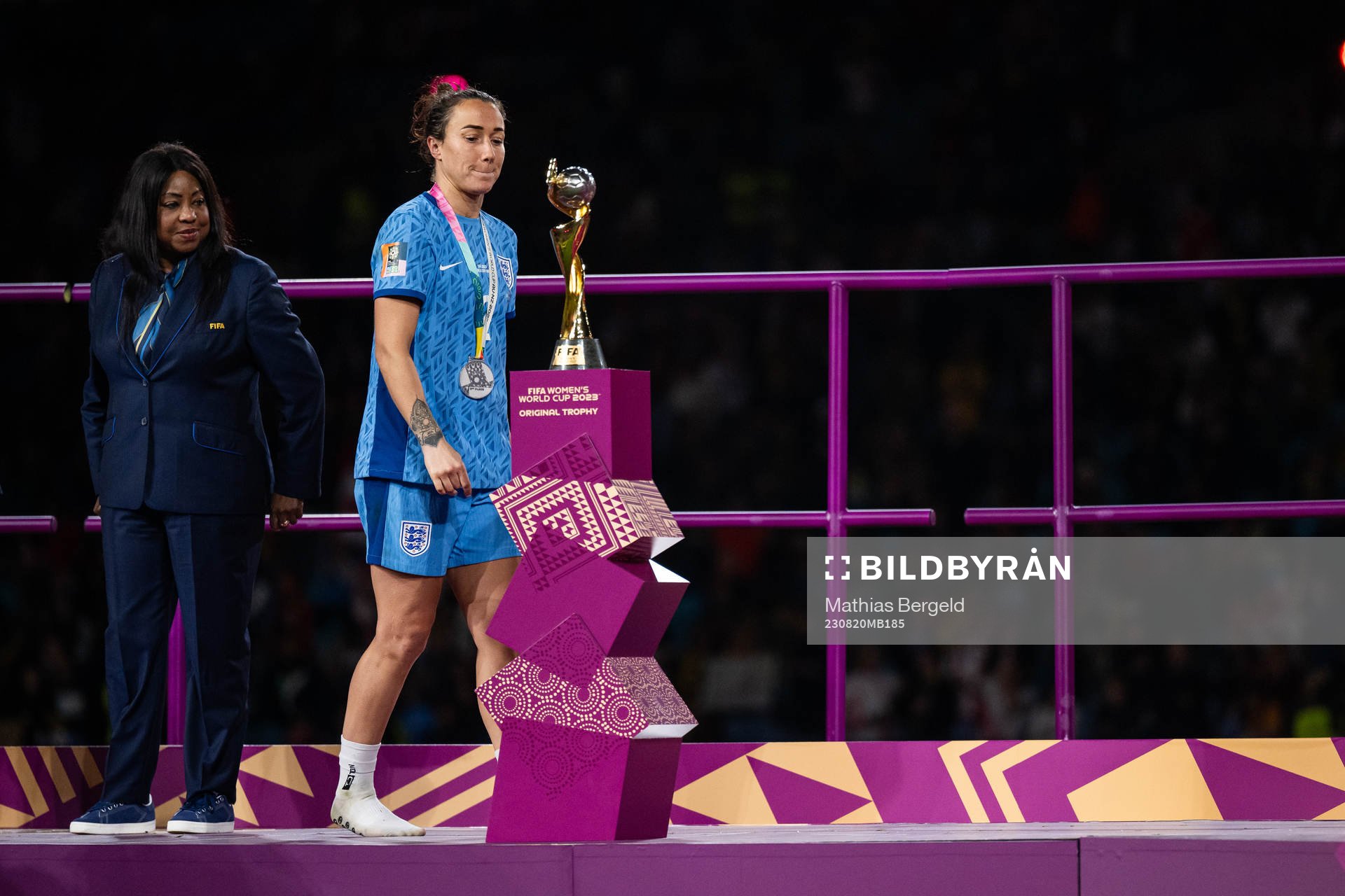 Lucy Bronze of England looks dejected as she walks by the