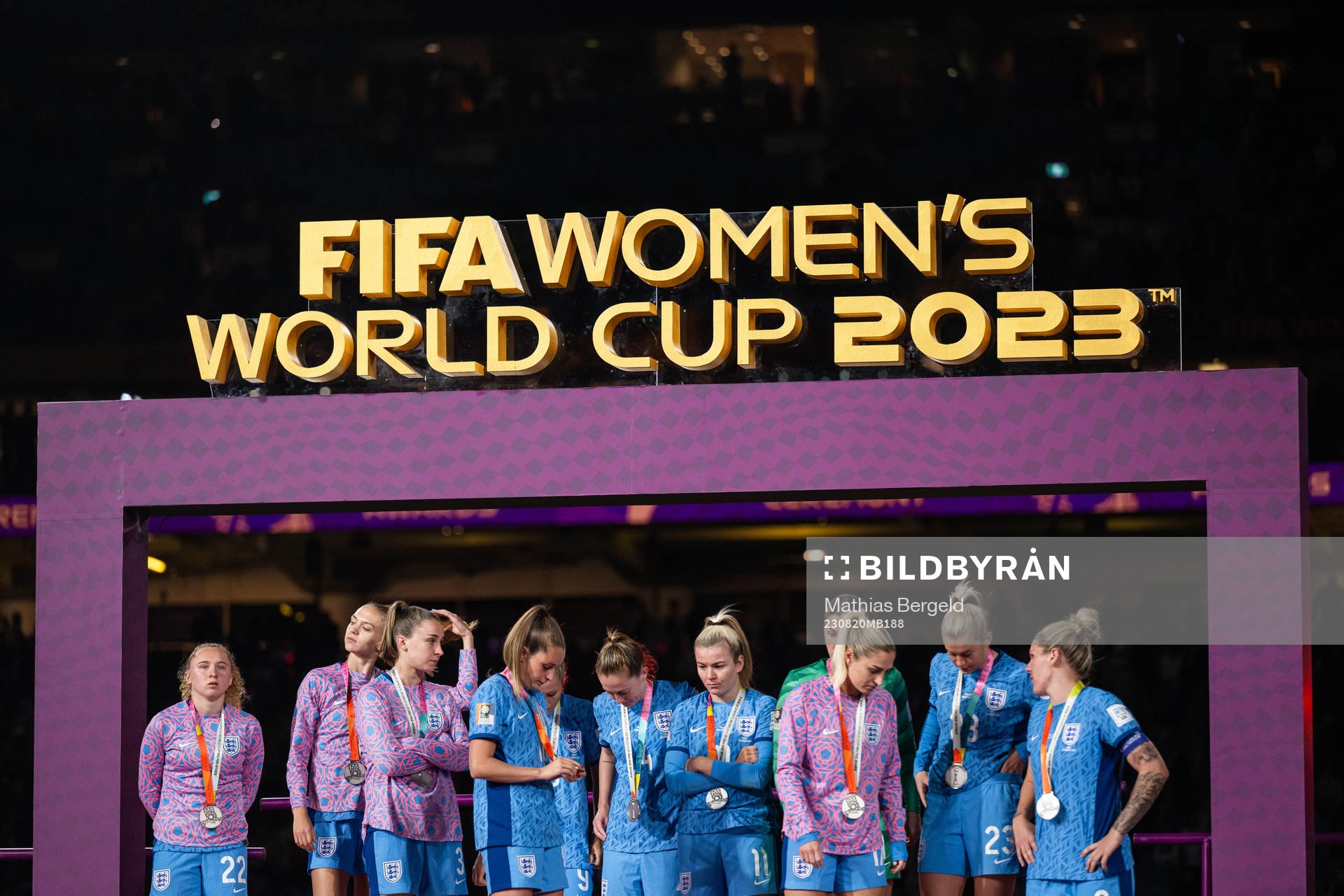 Players of England looks dejected at the medal ceremony