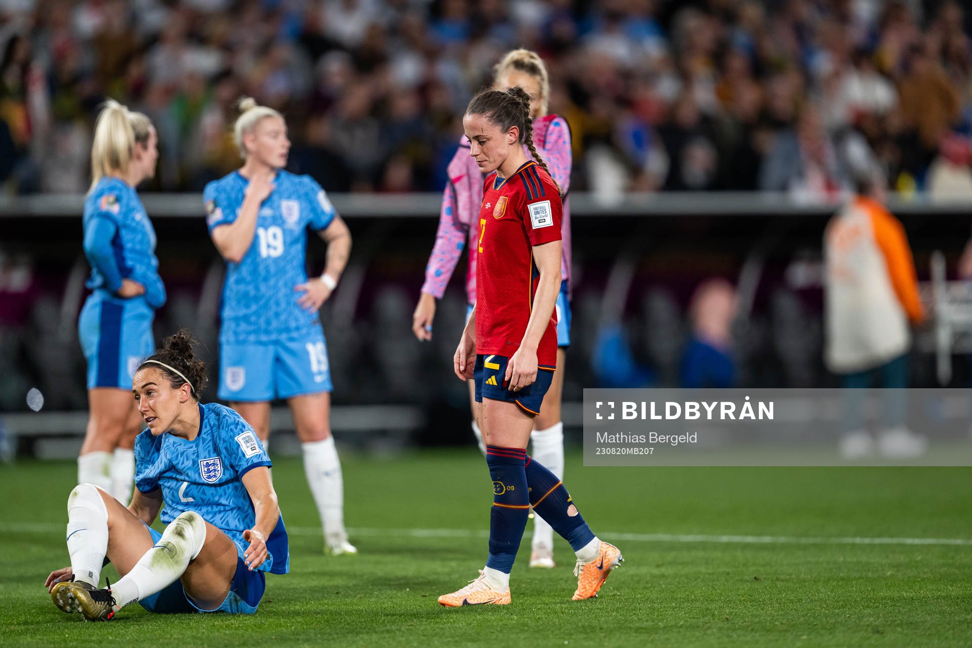 Lucy Bronze of England looks dejected next to Ona Batlle of