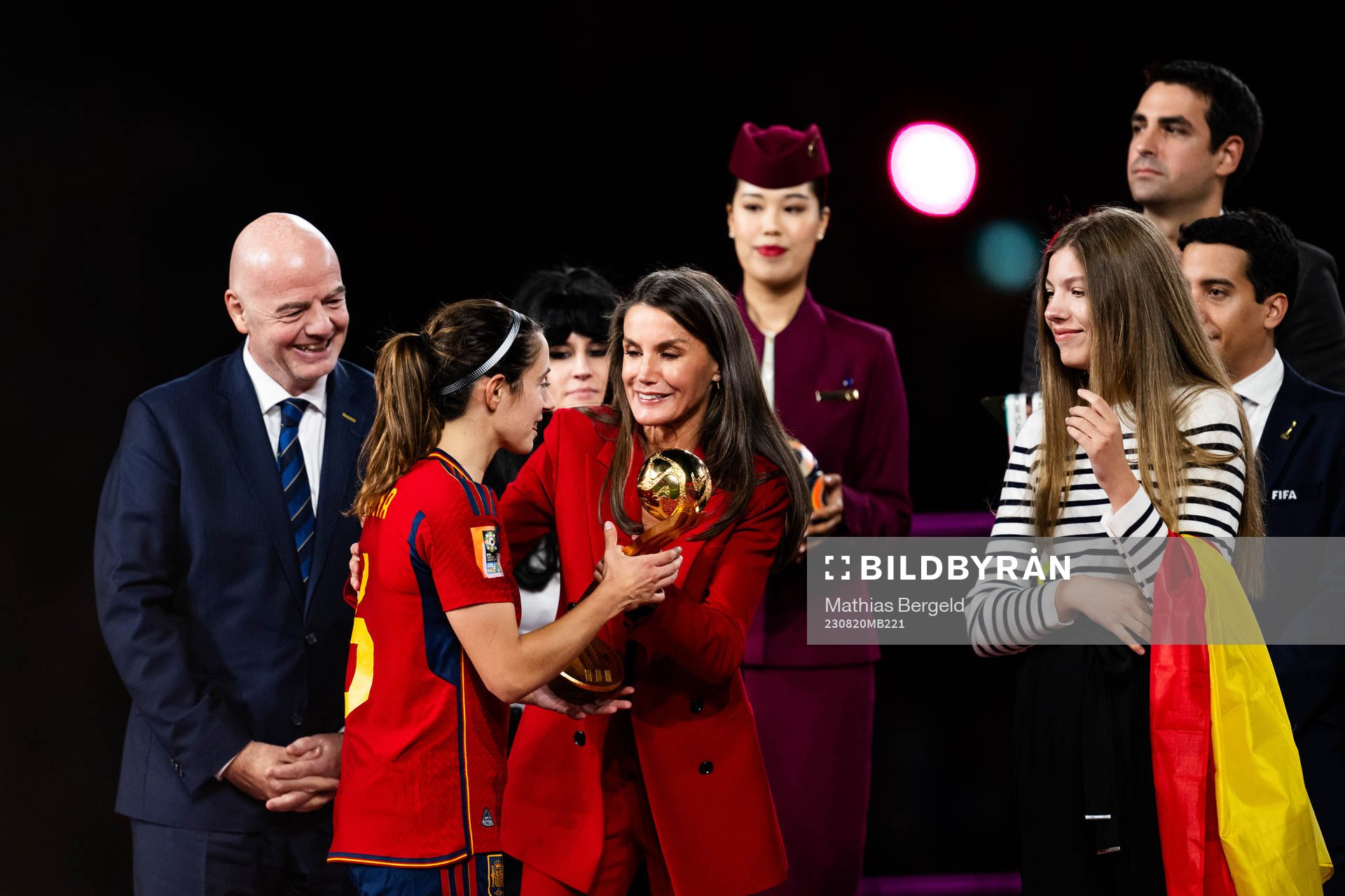 Queen Letizia and Princess Sofia of Spain hand out the