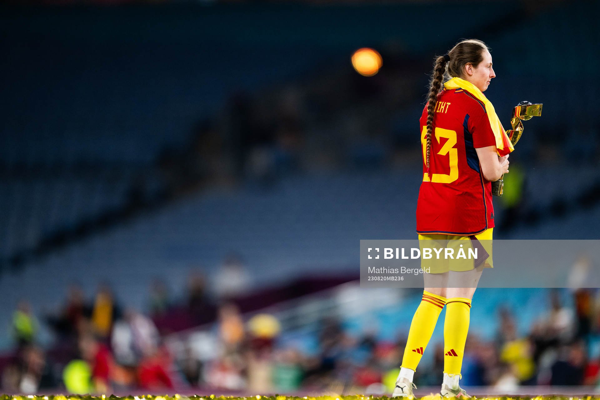 Goalkeeper Enith Salon of Spain celebrates with the trophy