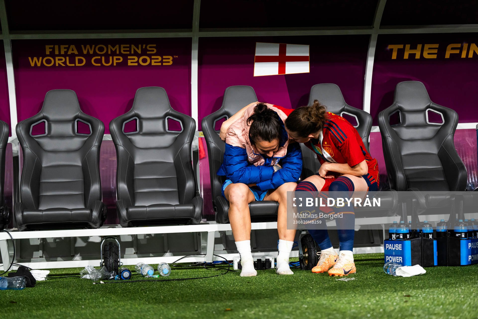 Lucy Bronze of England looks dejected and is consoled by
