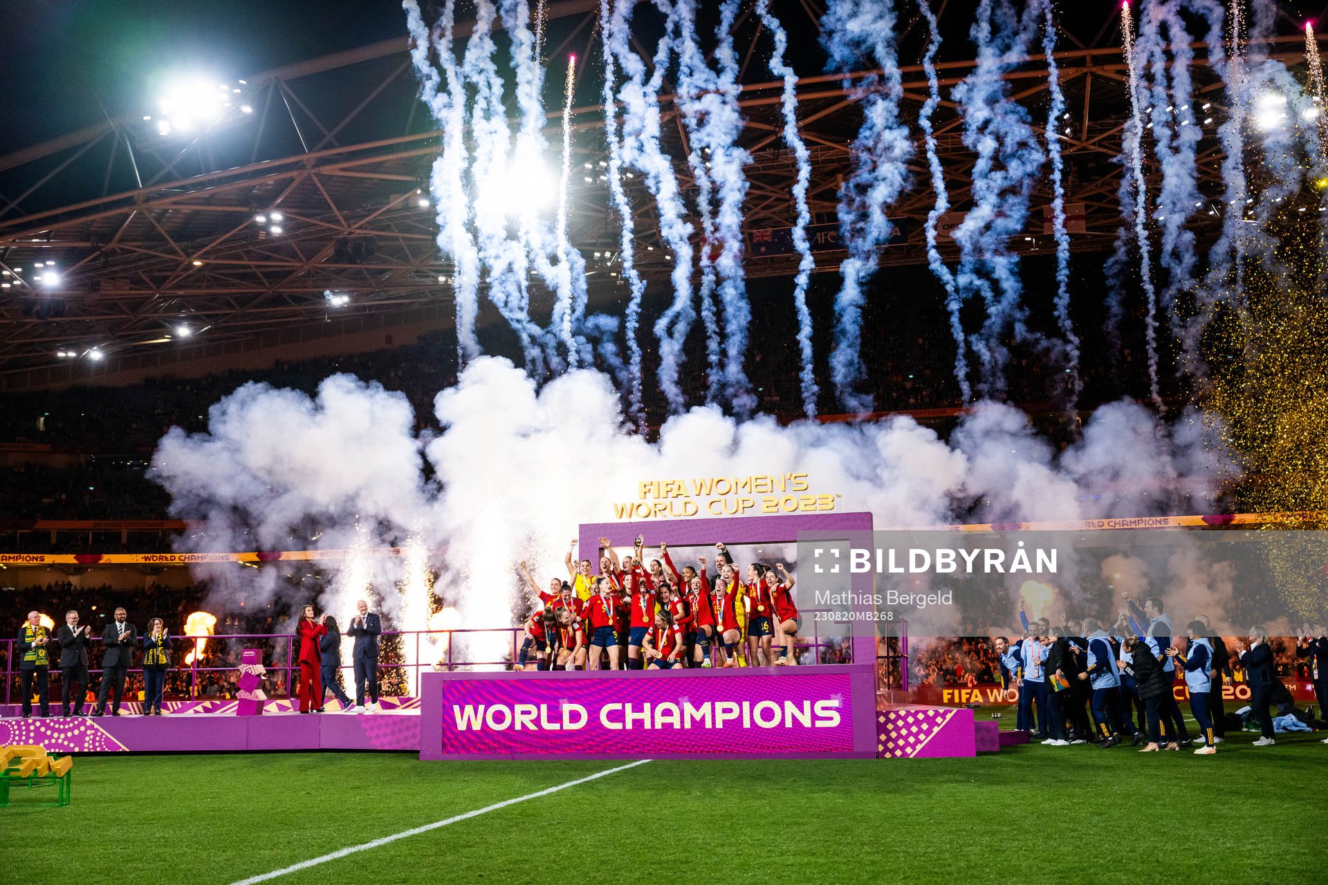 Players of Spain celebrate with the trophy at the medal