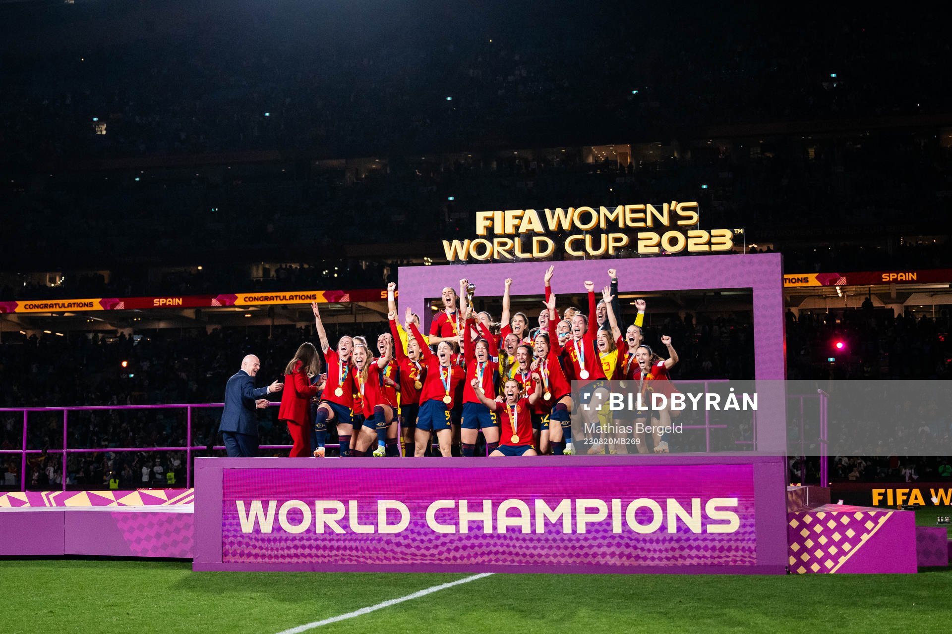 Players of Spain celebrate with the trophy at the medal