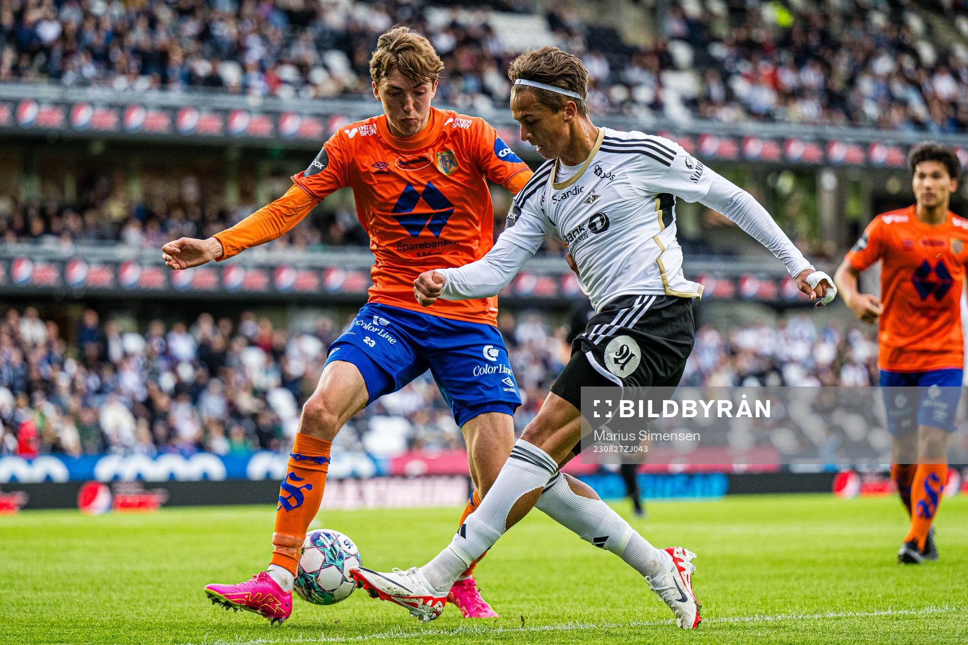 Erik Frøysa of Aalesund and Adrian Pereira of Rosenborg