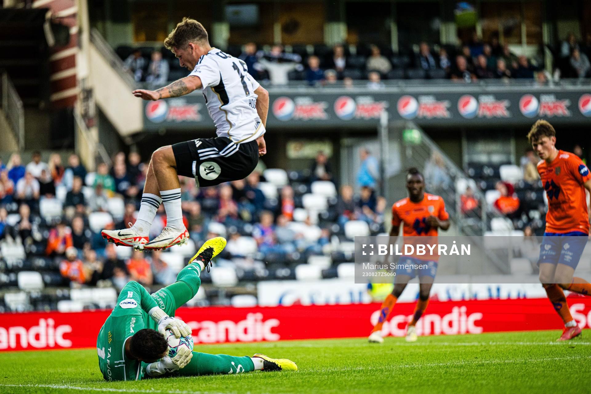 Carl Johan Holse of Rosenborg and goalkeeper Sten Michael