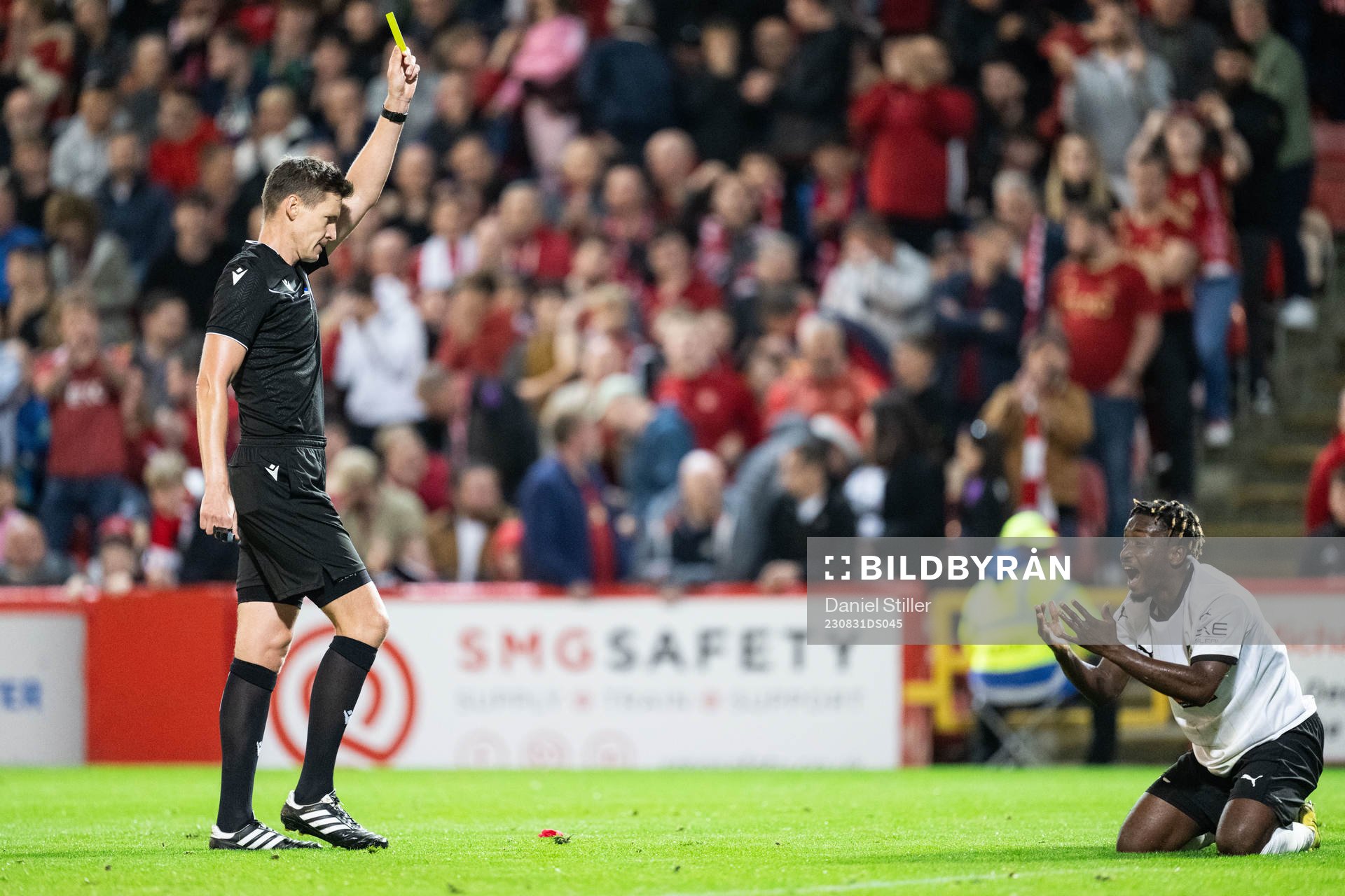 Ibrahim Sadiq  of Häcken reacts to receiving a yellow card