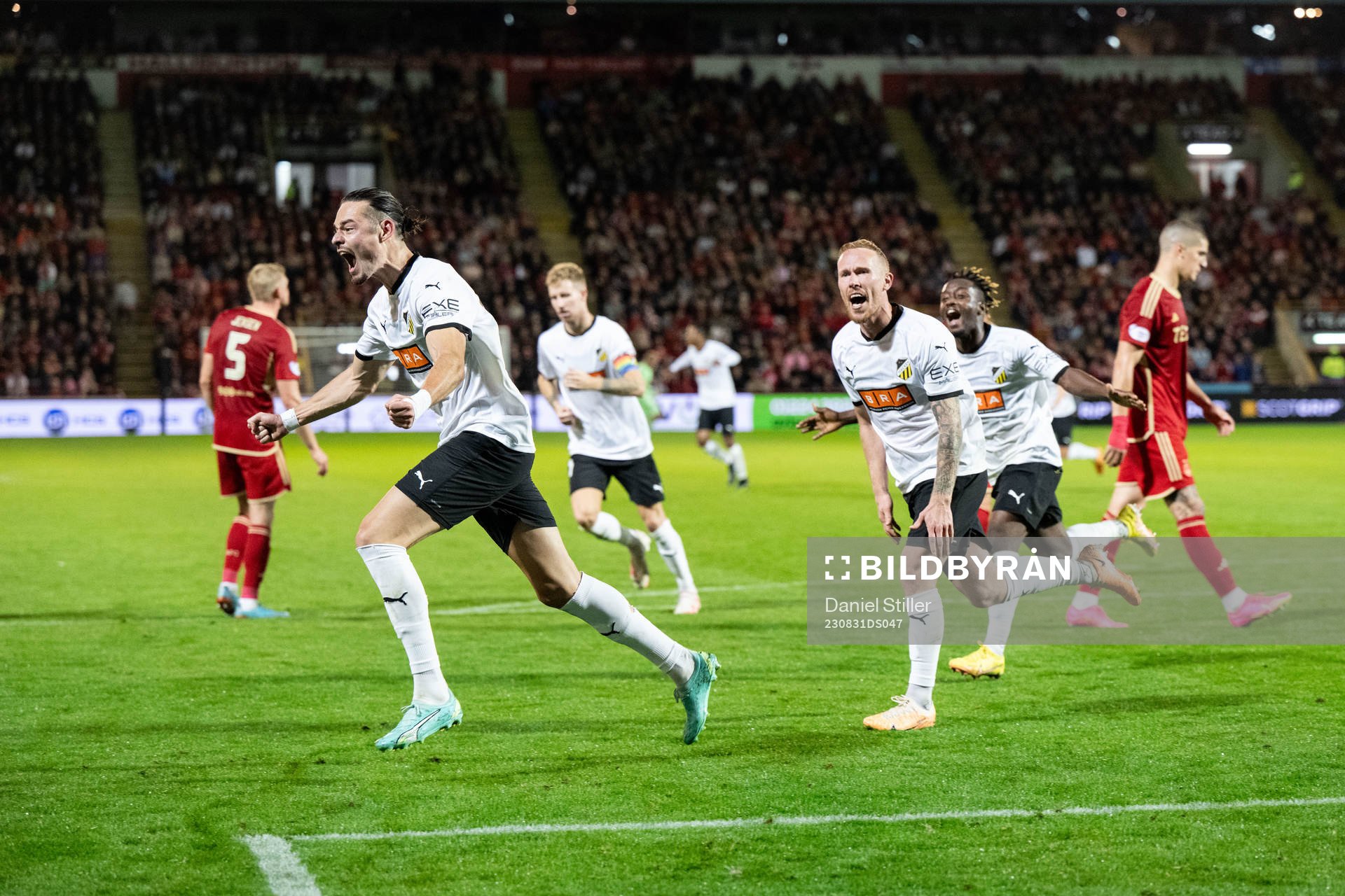 Amor Layouni of Häcken celebrates with Mikkel Rygaard