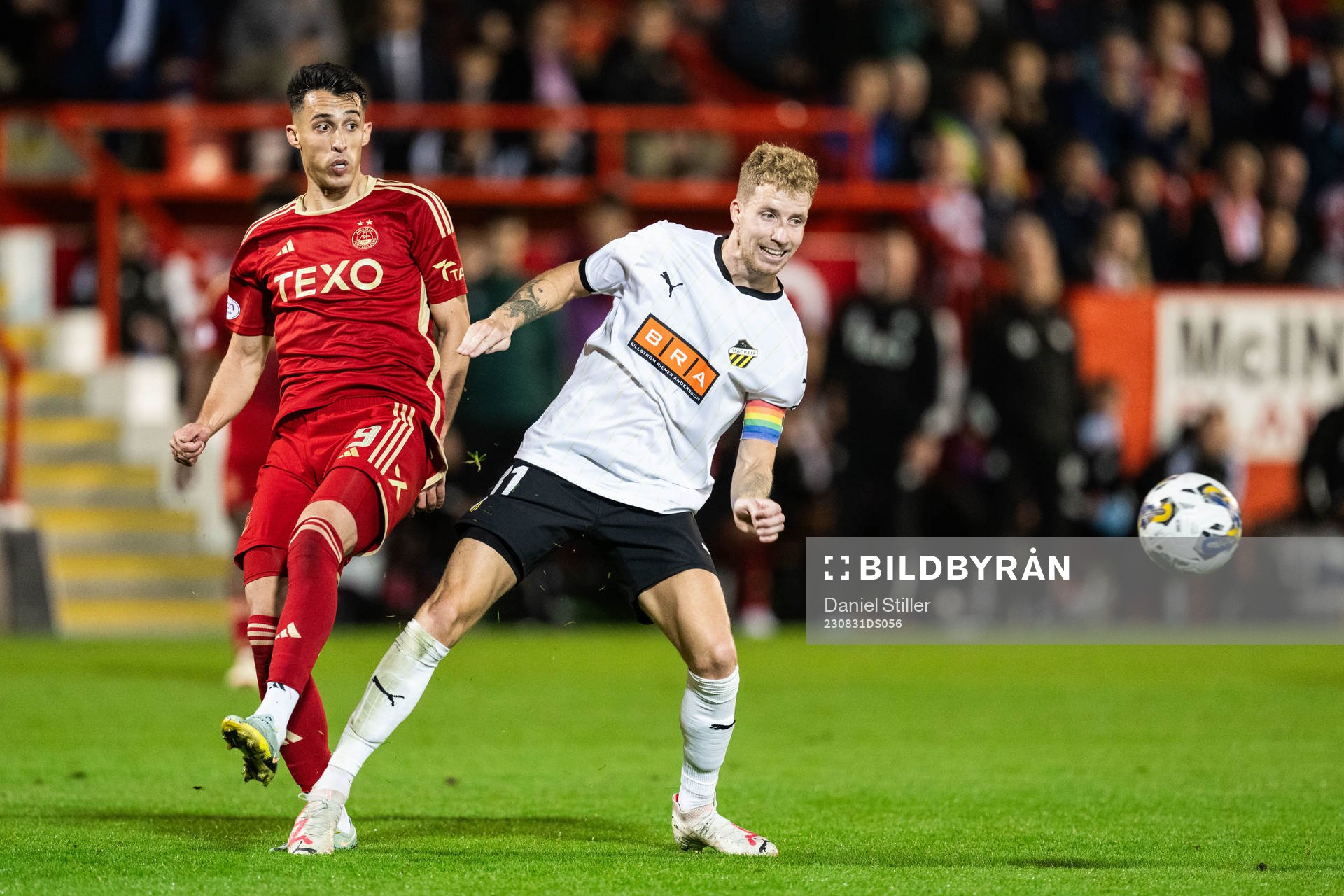 Bojan Miovski of Aberdeen and Samuel Gustafson of Häcken during the UEFA Europa League play-off between Aberdeen and Häcken on August 31, 2023 in Aberdeen. 