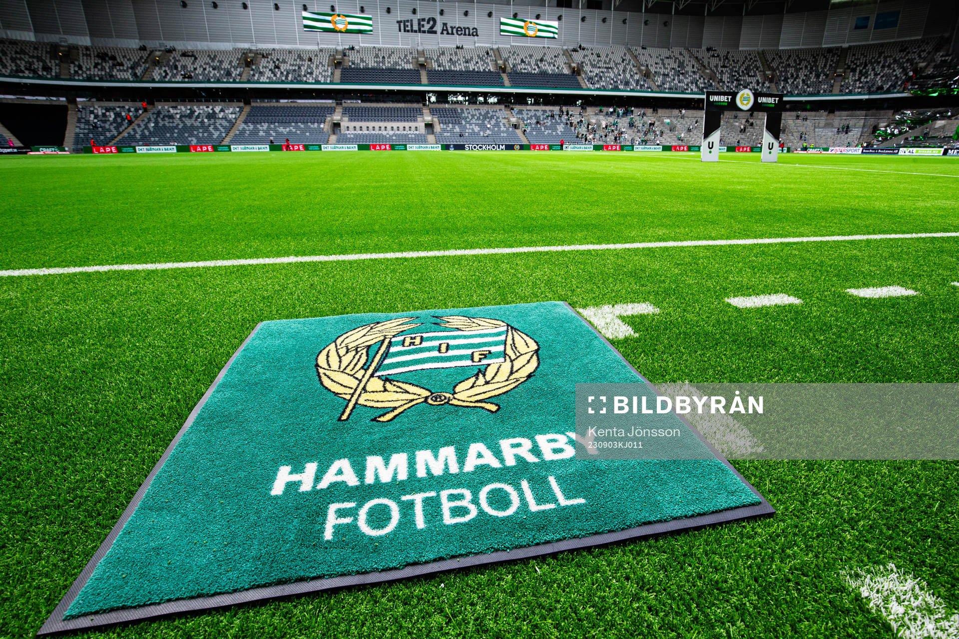 En matta med Hammarbys logotyp