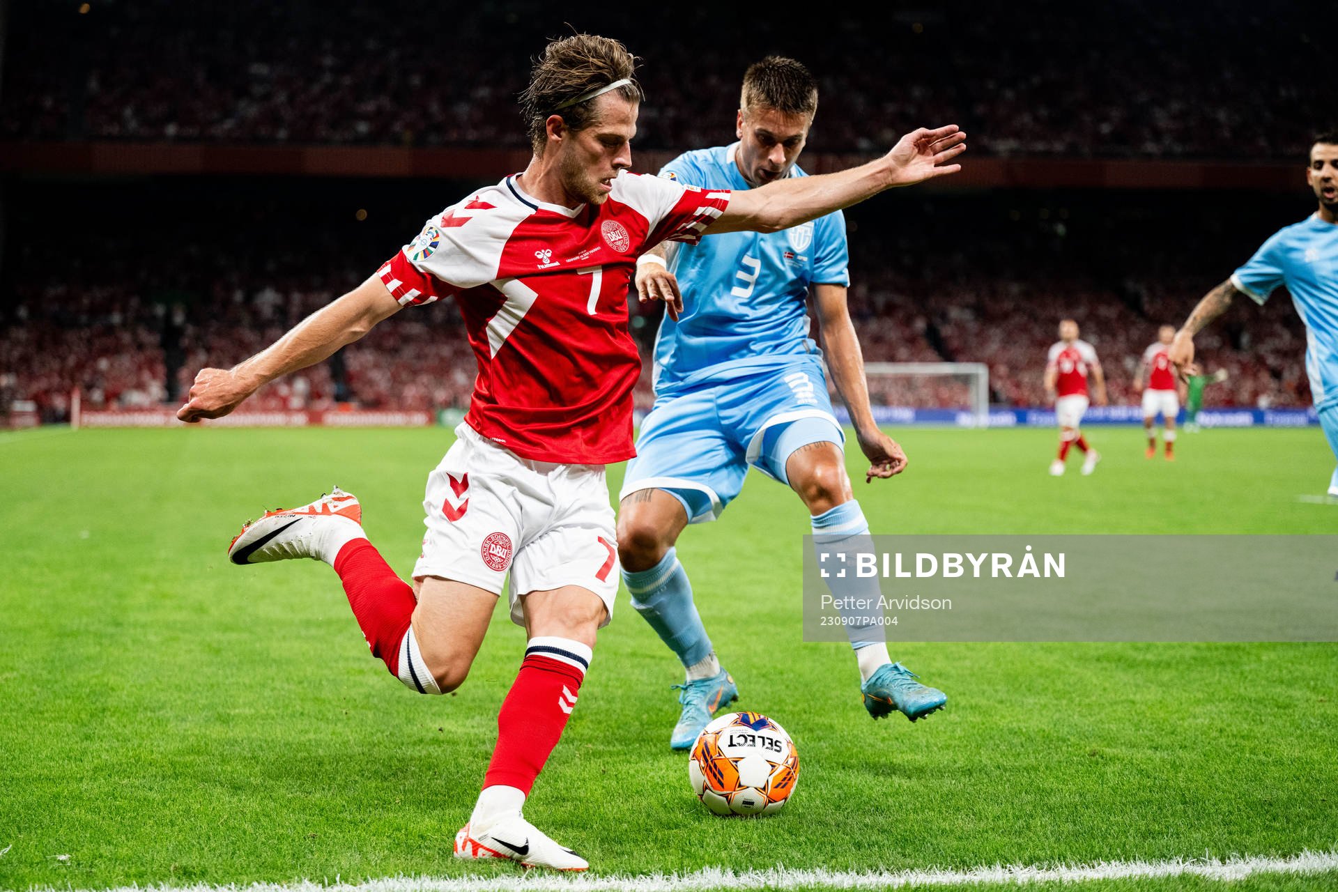 Mathias Jensen of Denmark and Alessandro Tosi  of San Marino