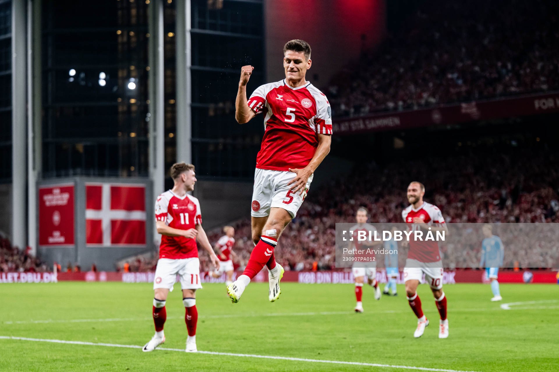 Joakim Mæhle of Denmark celebrates