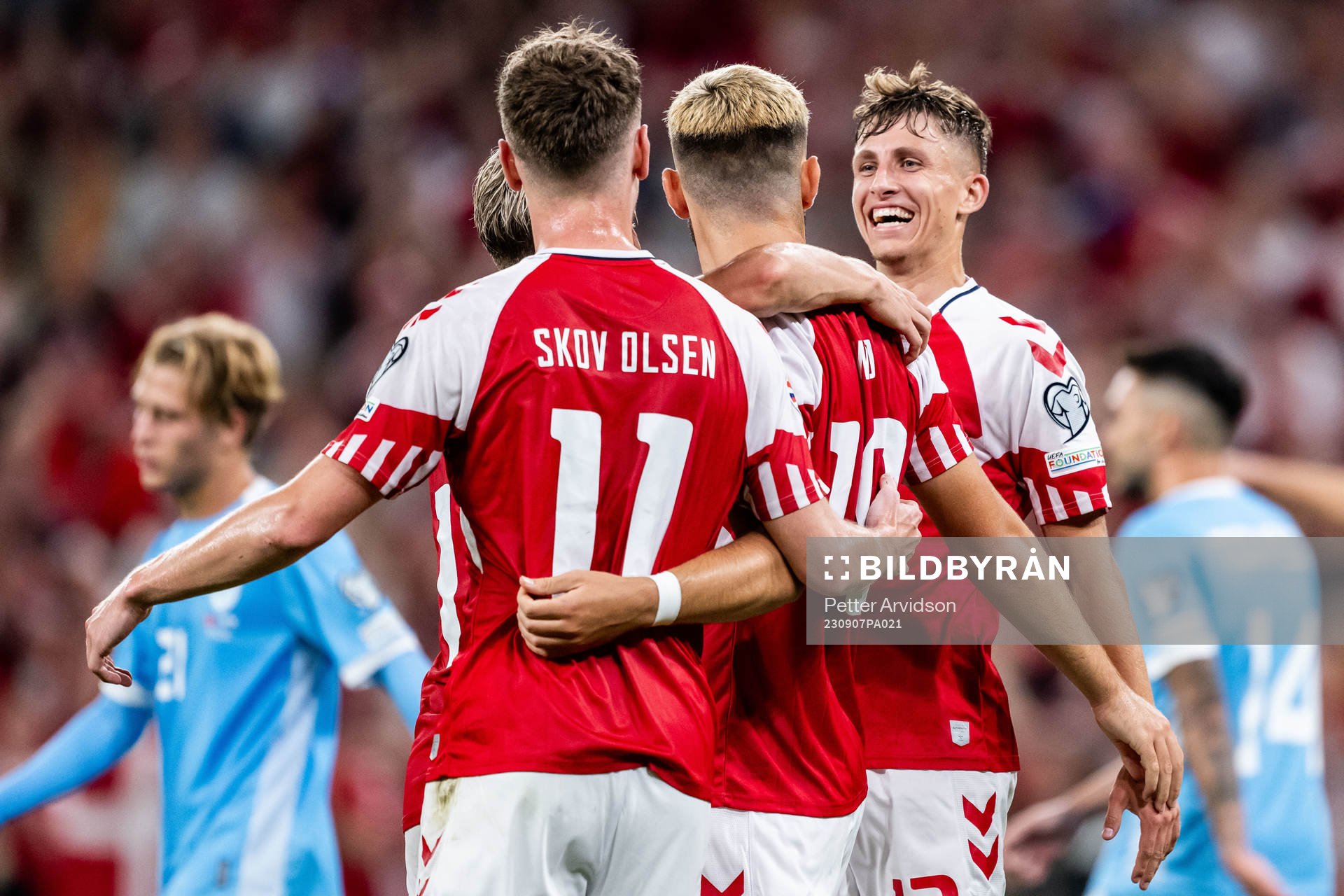 Jonas Wind of Denmark celebrates with Andreas Skov Olsen