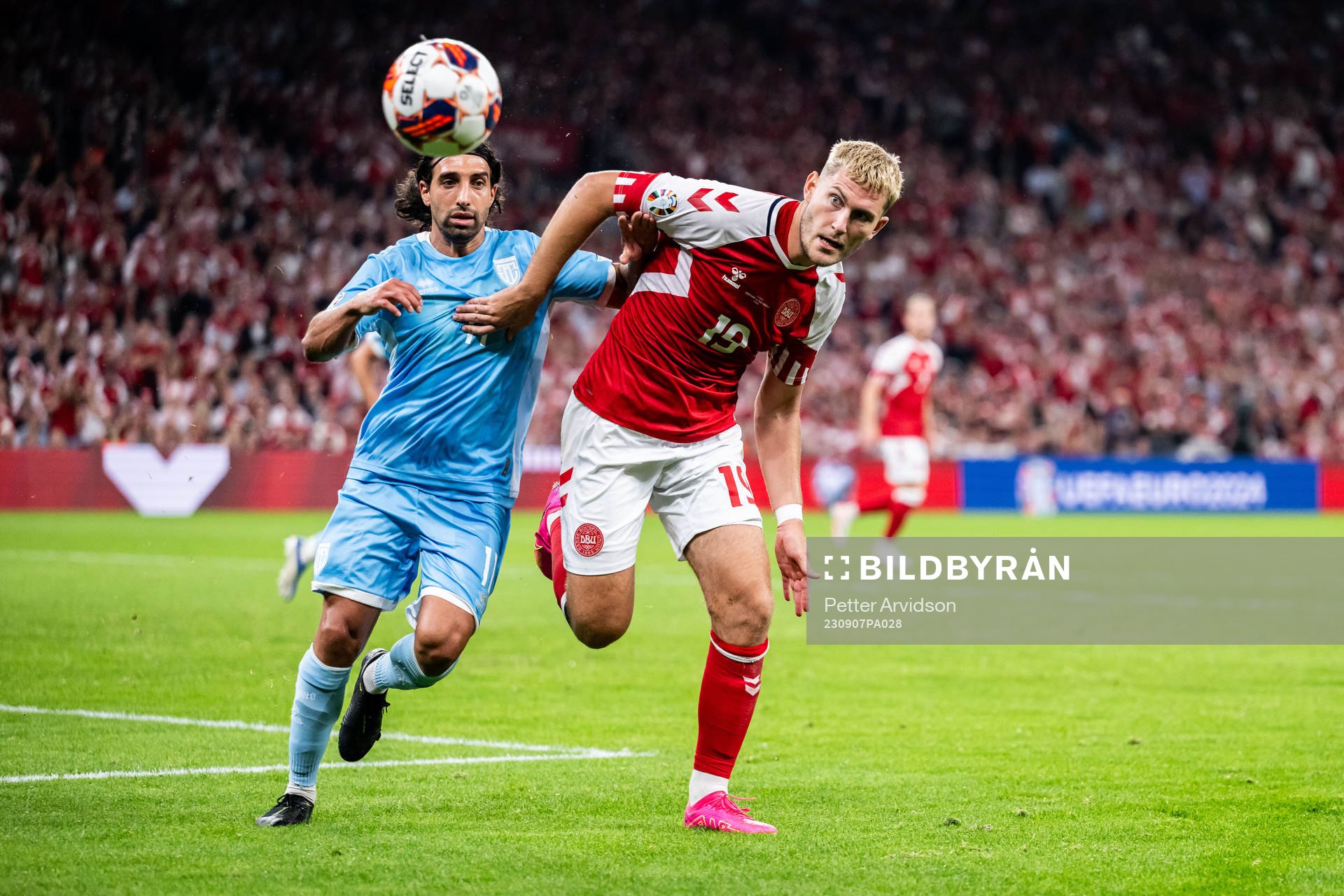 Manuel Battistini of San Marino and Jonas Wind of Denmark