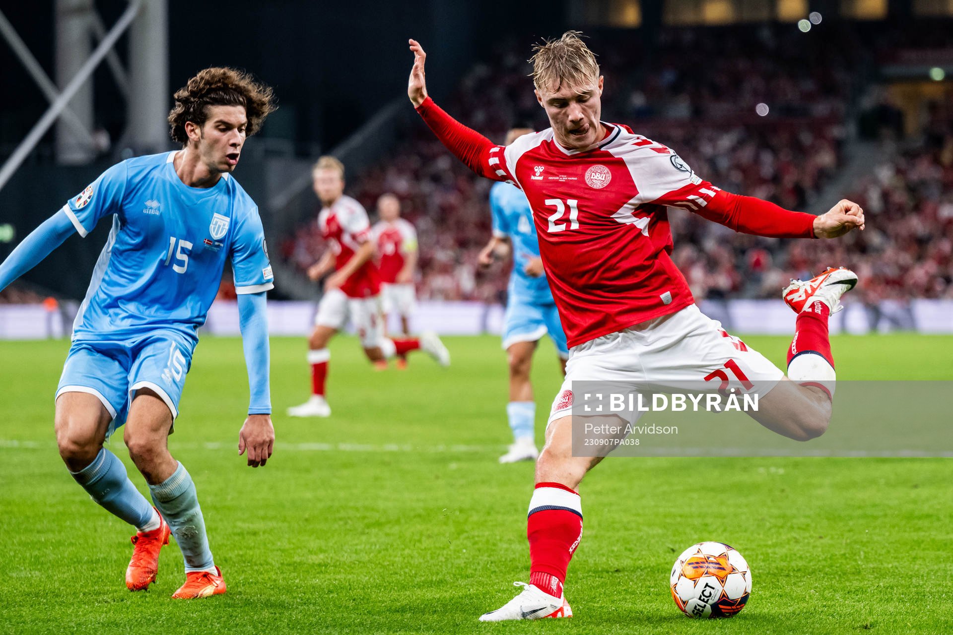 Simone Franciosi of San Marino and Rasmus Højlund of