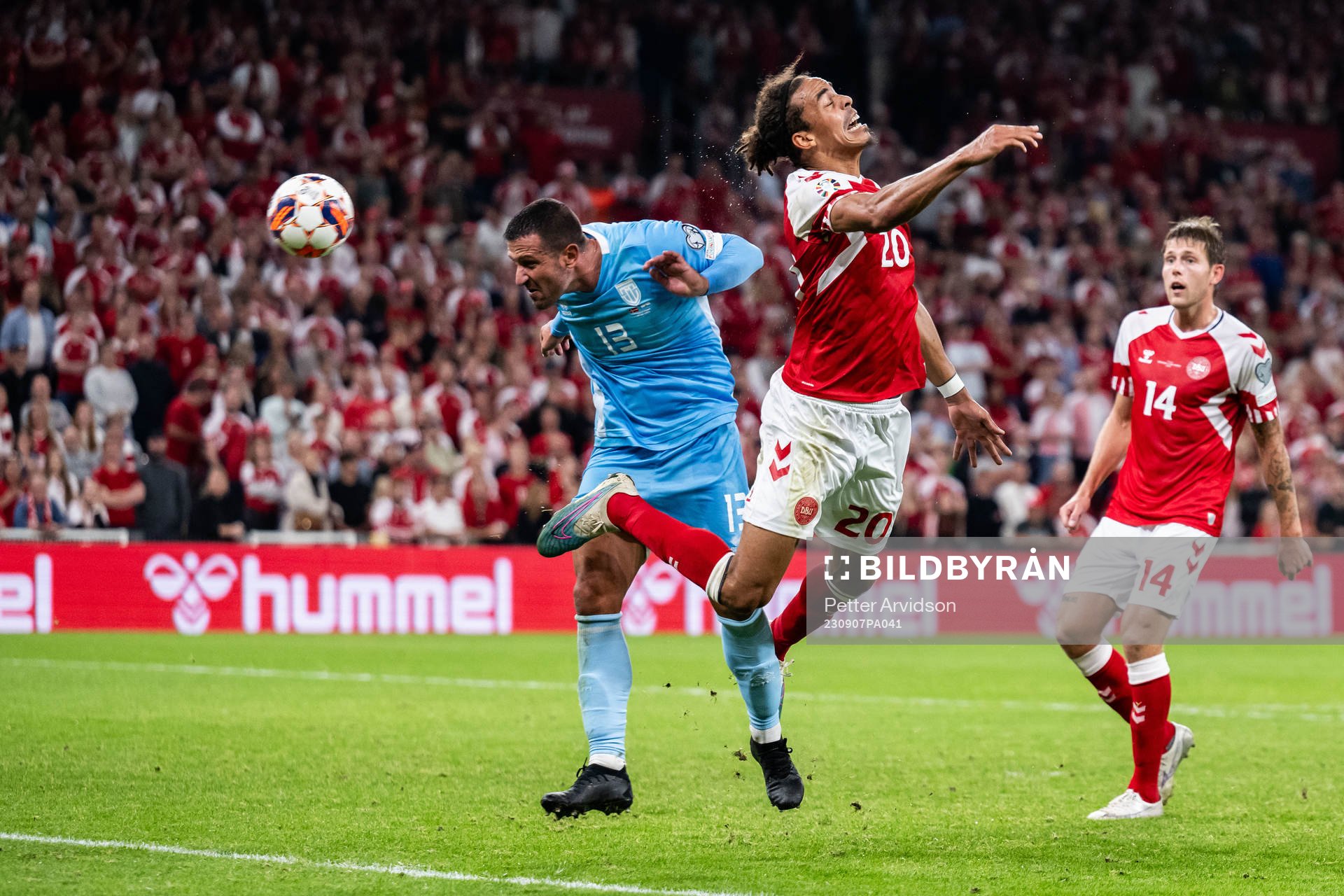 Yussuf Poulsen of Denmark scores 4-0 behind Roberto Di Maio