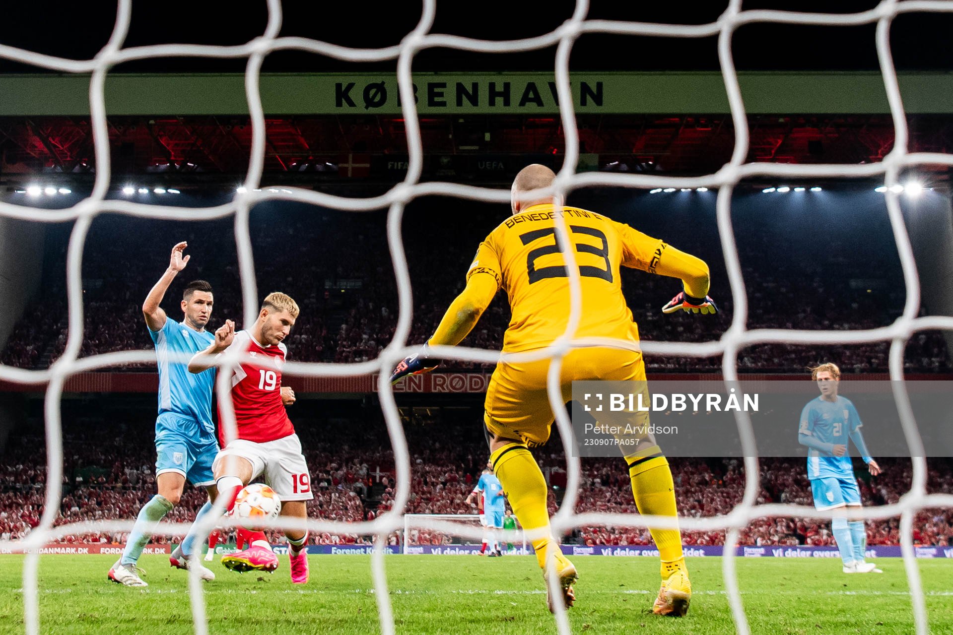 Jonas Wind of Denmark scores the 3-0 goal against