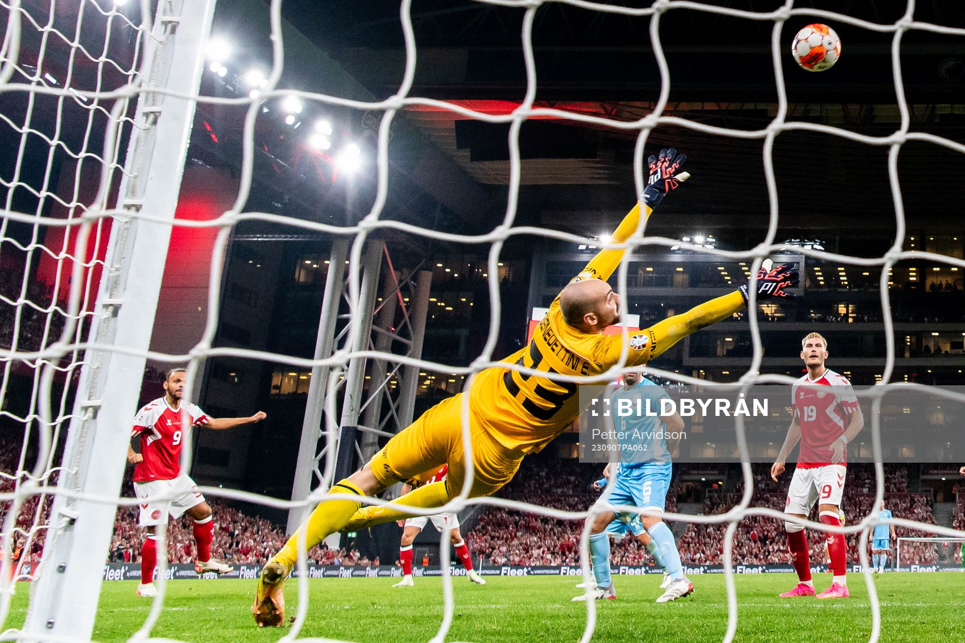 Martin Braithwaite of Denmark against goalkeeper Elia