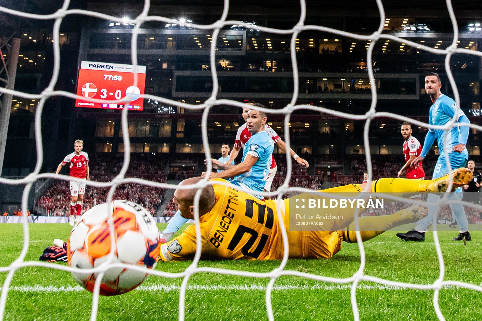 Morten Hjulmand of Denmark scores a goal against goalkeeper