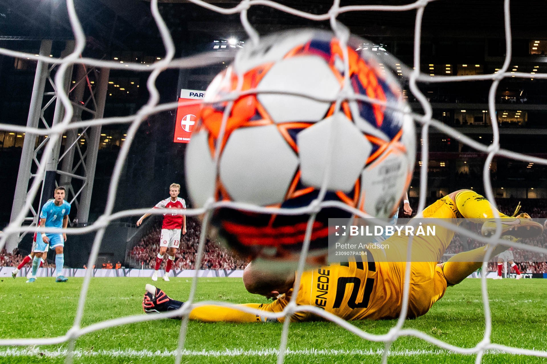 Morten Hjulmand of Denmark scores a goal against goalkeeper