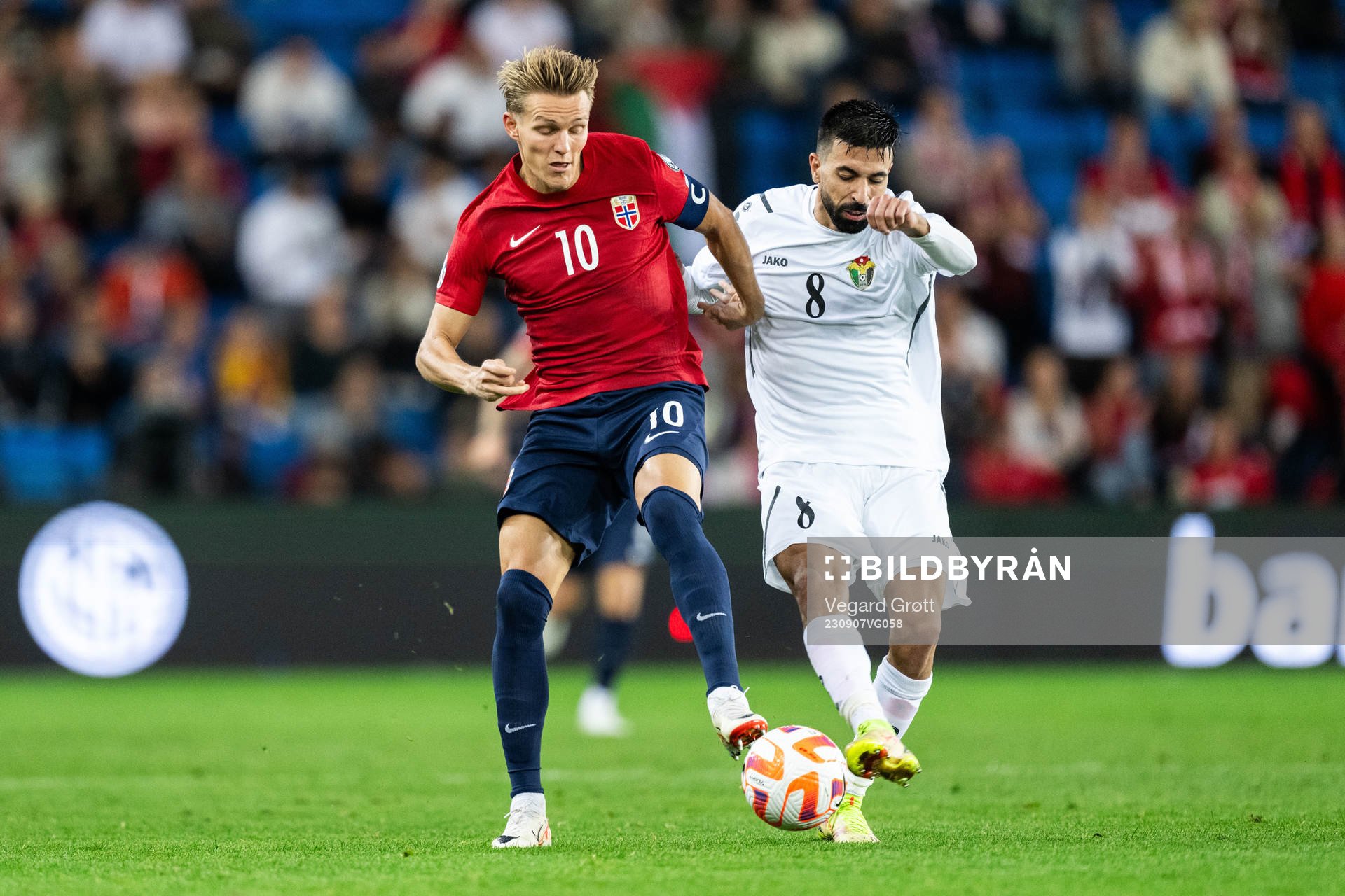 Martin Ødegaard of Norway and Noor Al-Rawabdeh of Norway