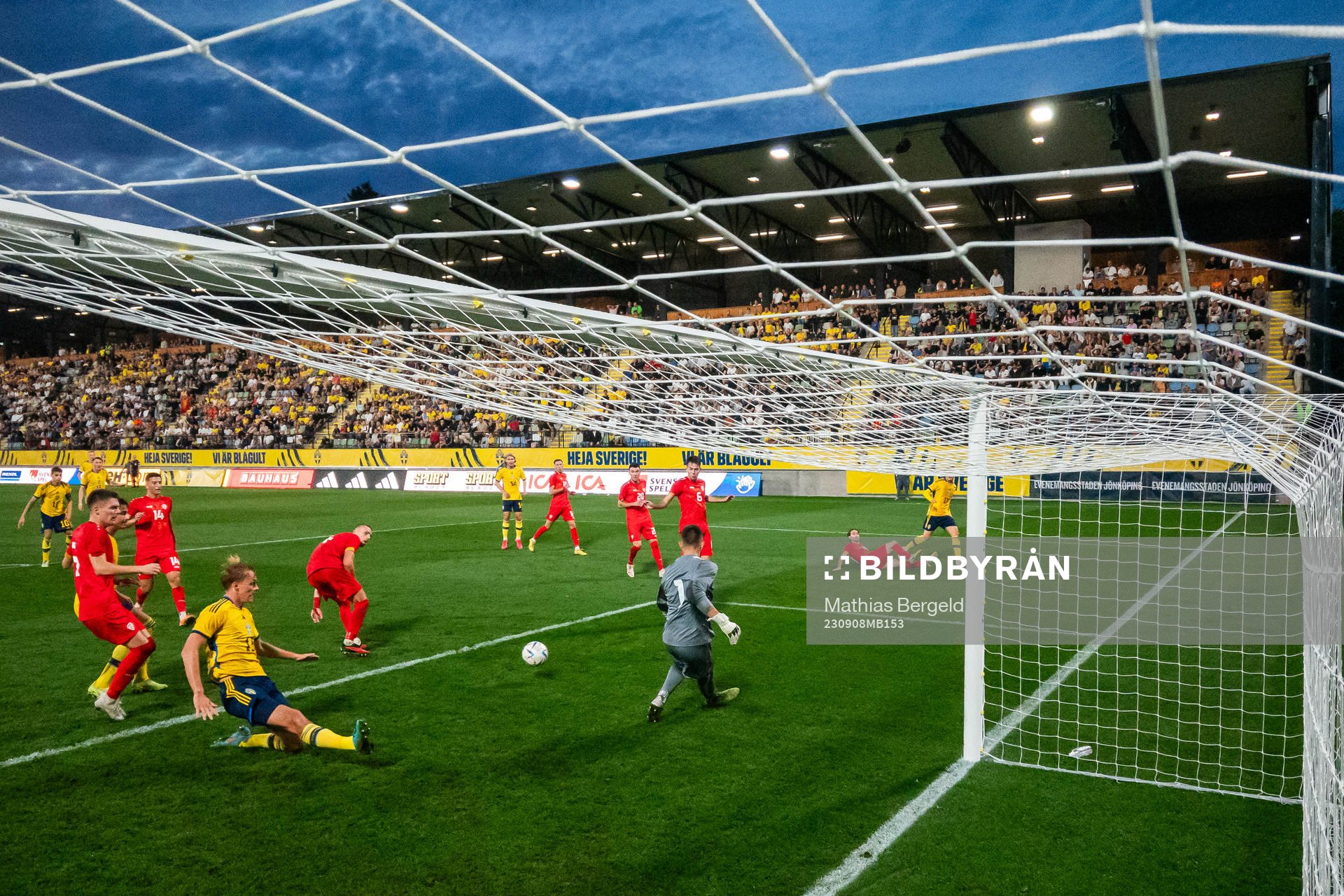 Oscar Vilhelmsson of Sweden and goalkeeper Marko Alchevski