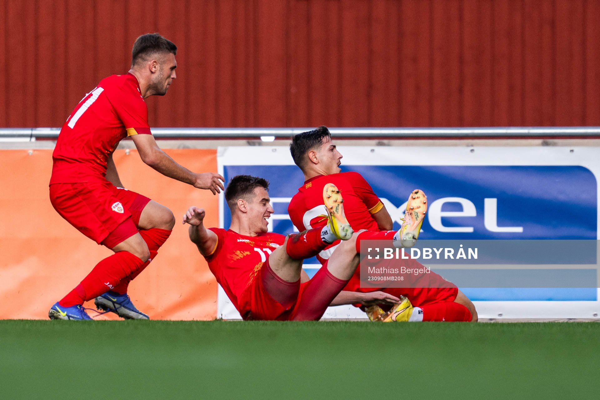 Hamza Ramani and Metodi Maksimov celebrate with Ivan Nikolov of North Macedonia after he scored 0-1 during the UEFA European Under-21 Qualifier football match between Sweden and North Macedonia on September 8, 2023 in Jönköping.