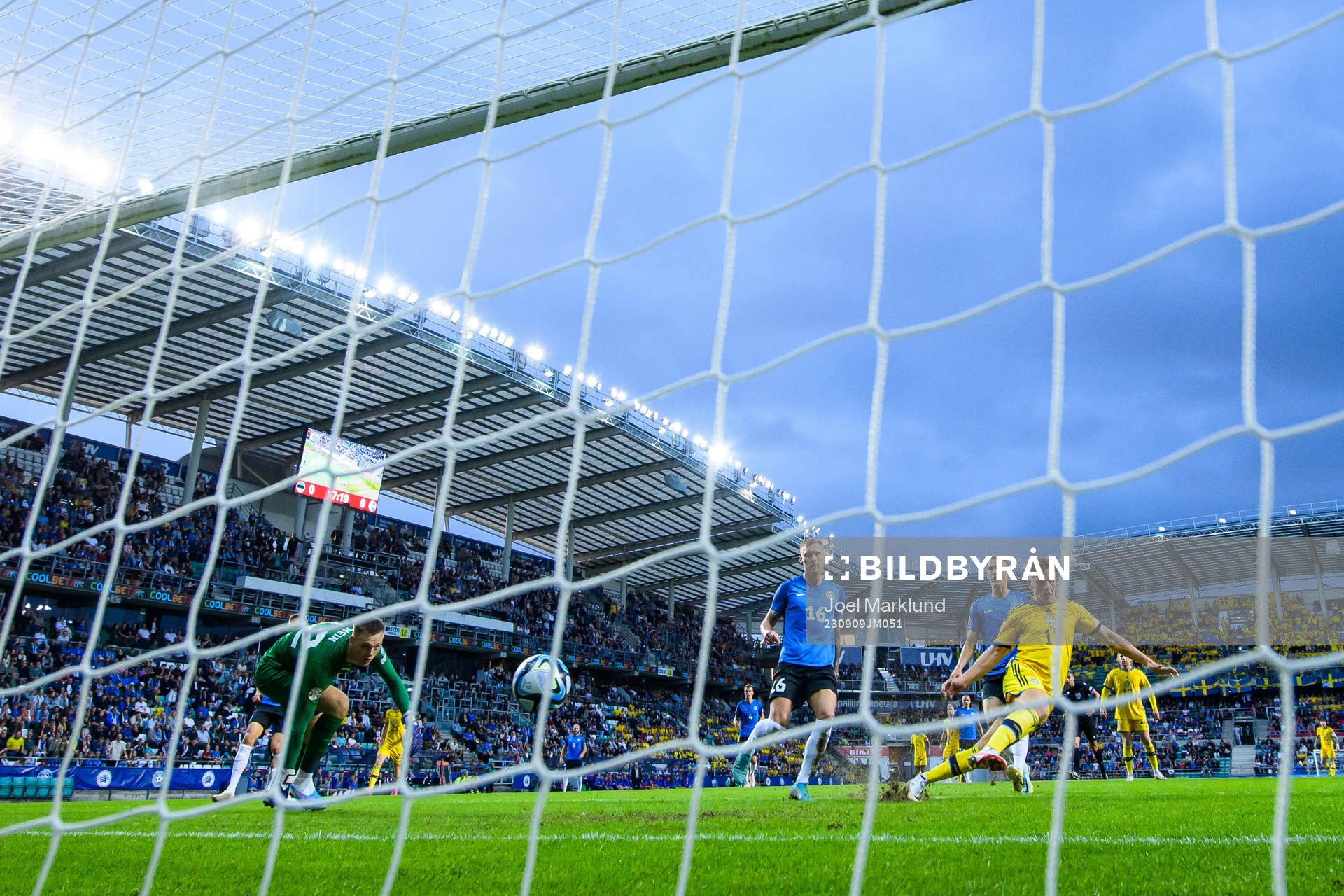 Viktor Gyökeres of Sweden scores 0-1 behind goalkeeper