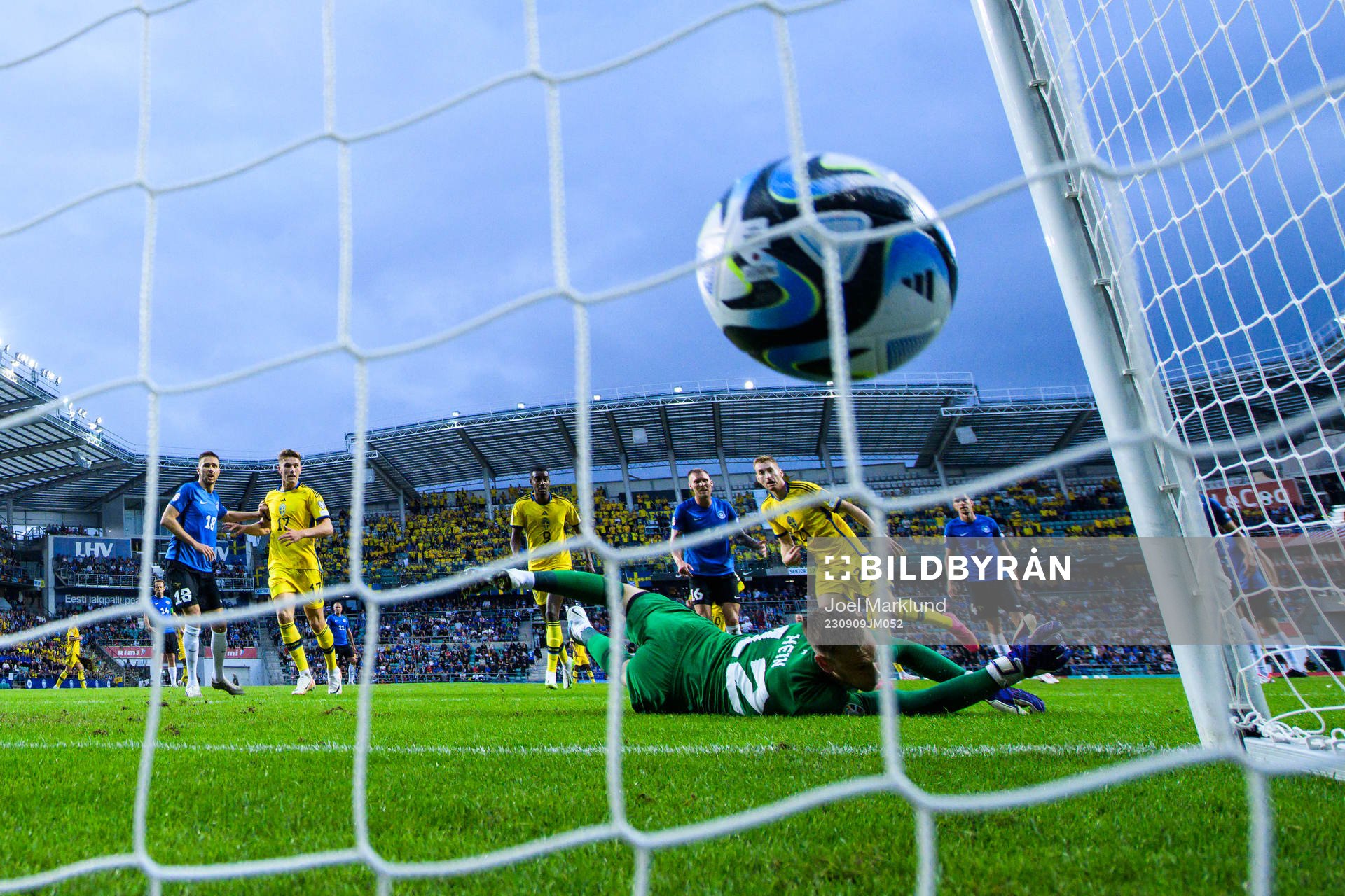 Dejan Kulusevski of Sweden scores 0-2 behind goalkeeper