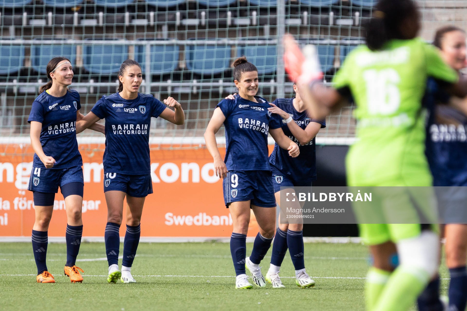 Mathilde Bourdieu of Paris FC celebrate with teammates