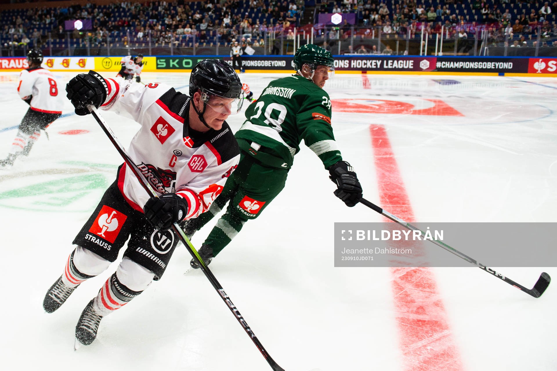 Lasse Bo Knudsen of Aalborg Pirates and Mattias Göransson