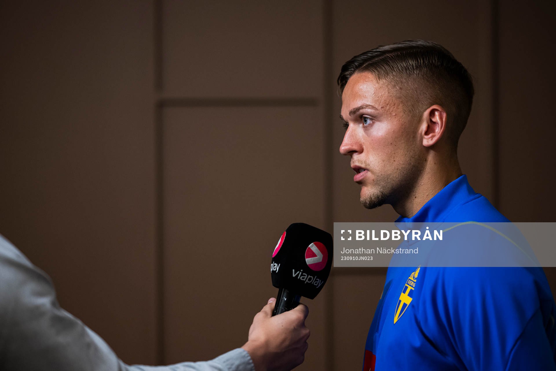 of the Swedish national football team at a Mixed Zone