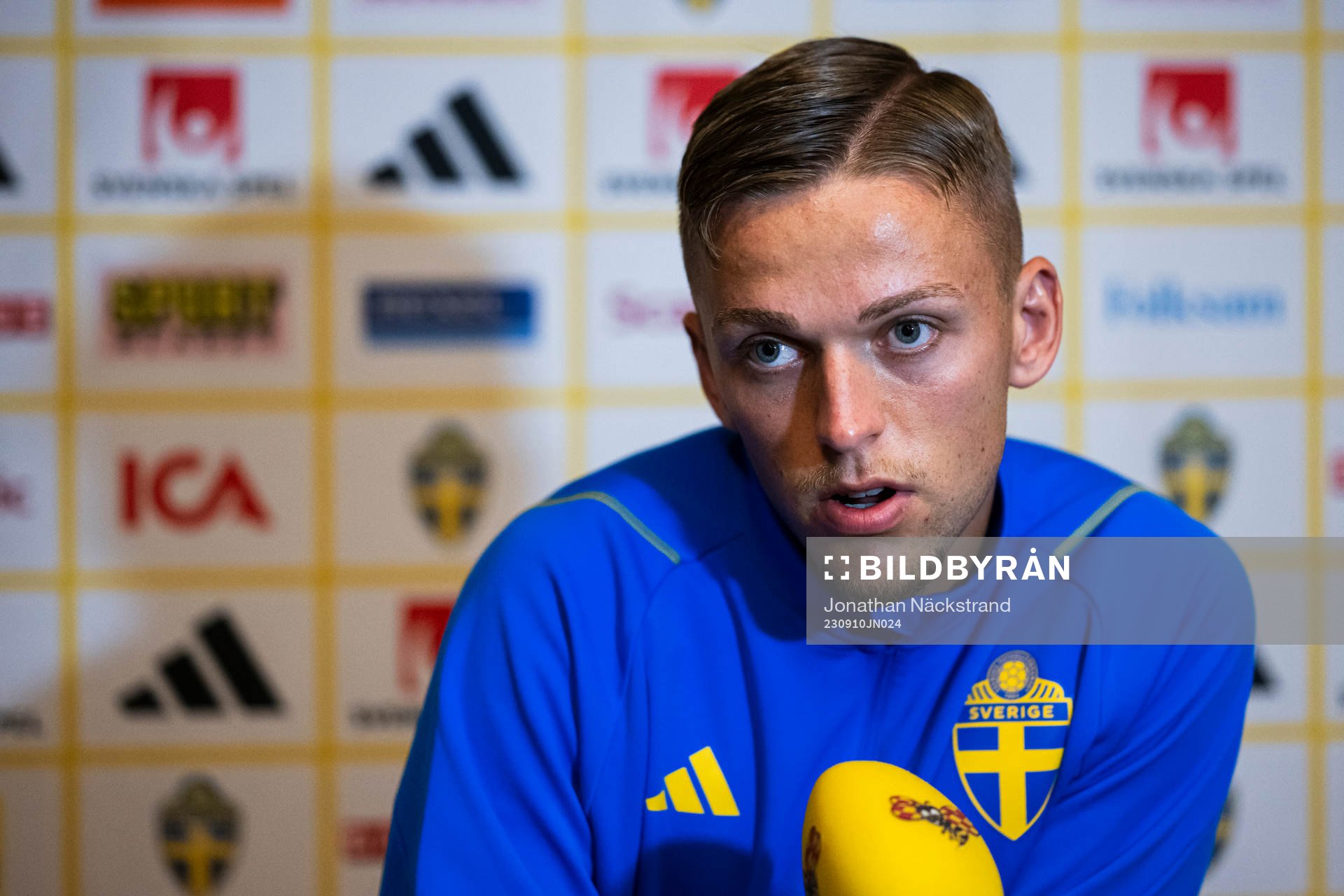 of the Swedish national football team at a Mixed Zone