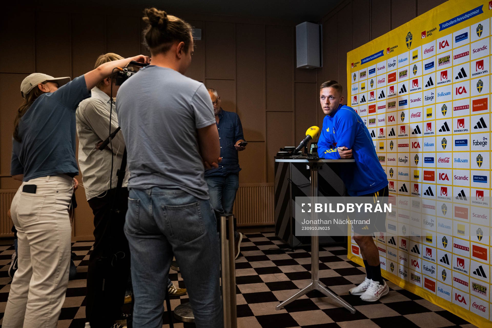 of the Swedish national football team at a Mixed Zone