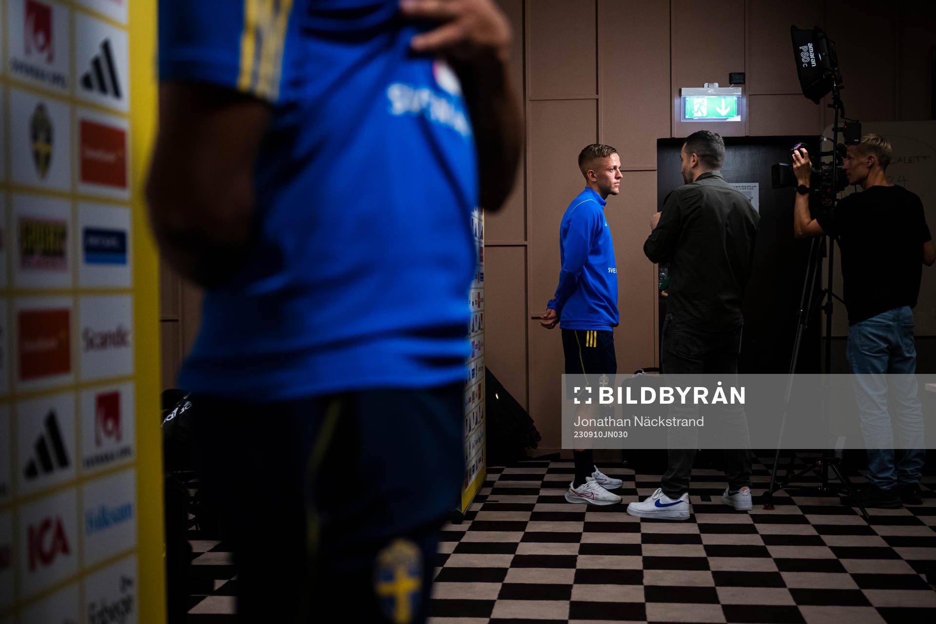of the Swedish national football team at a Mixed Zone