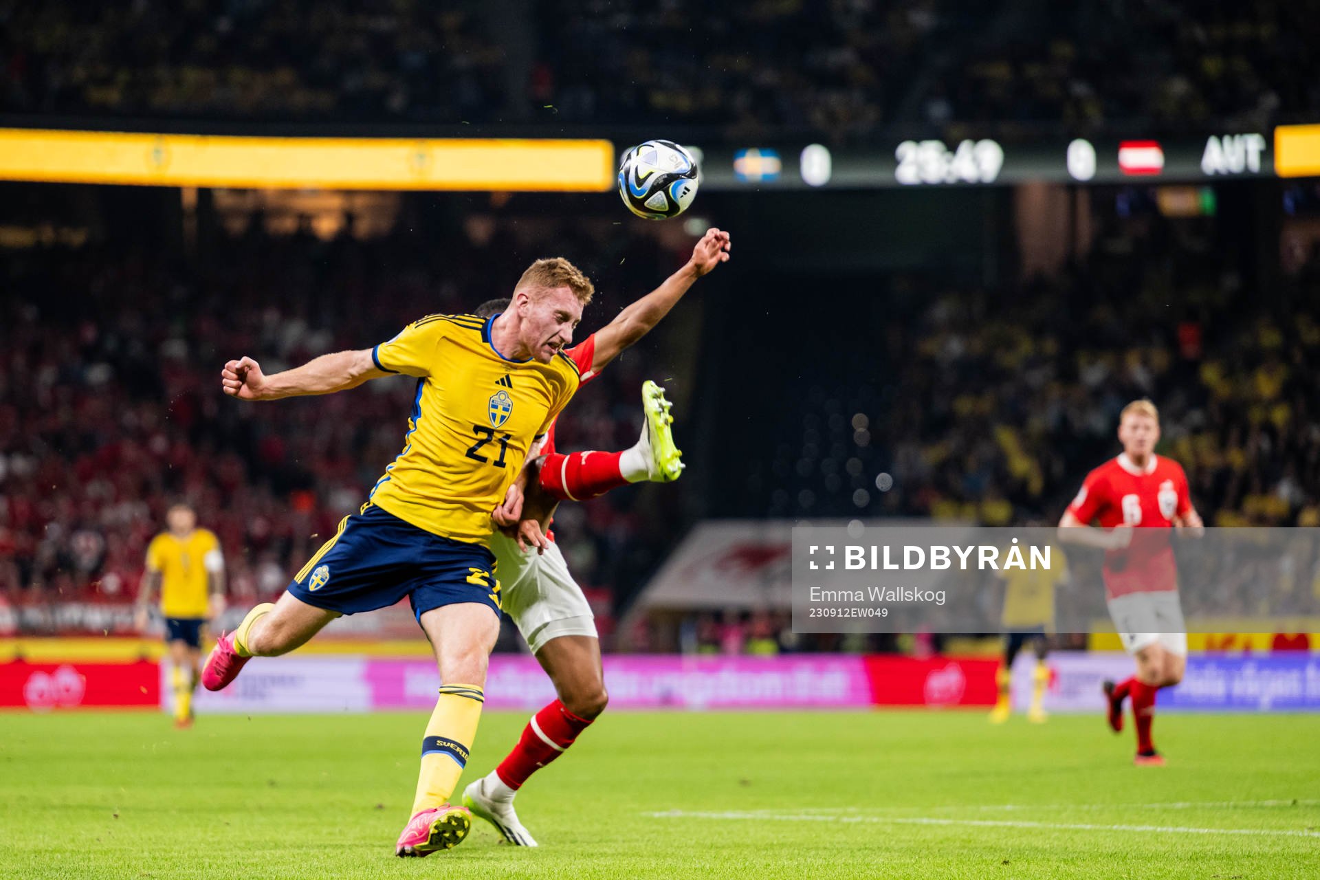 Dejan Kulusevski of Sweden and Phillipp Mwene of Austria