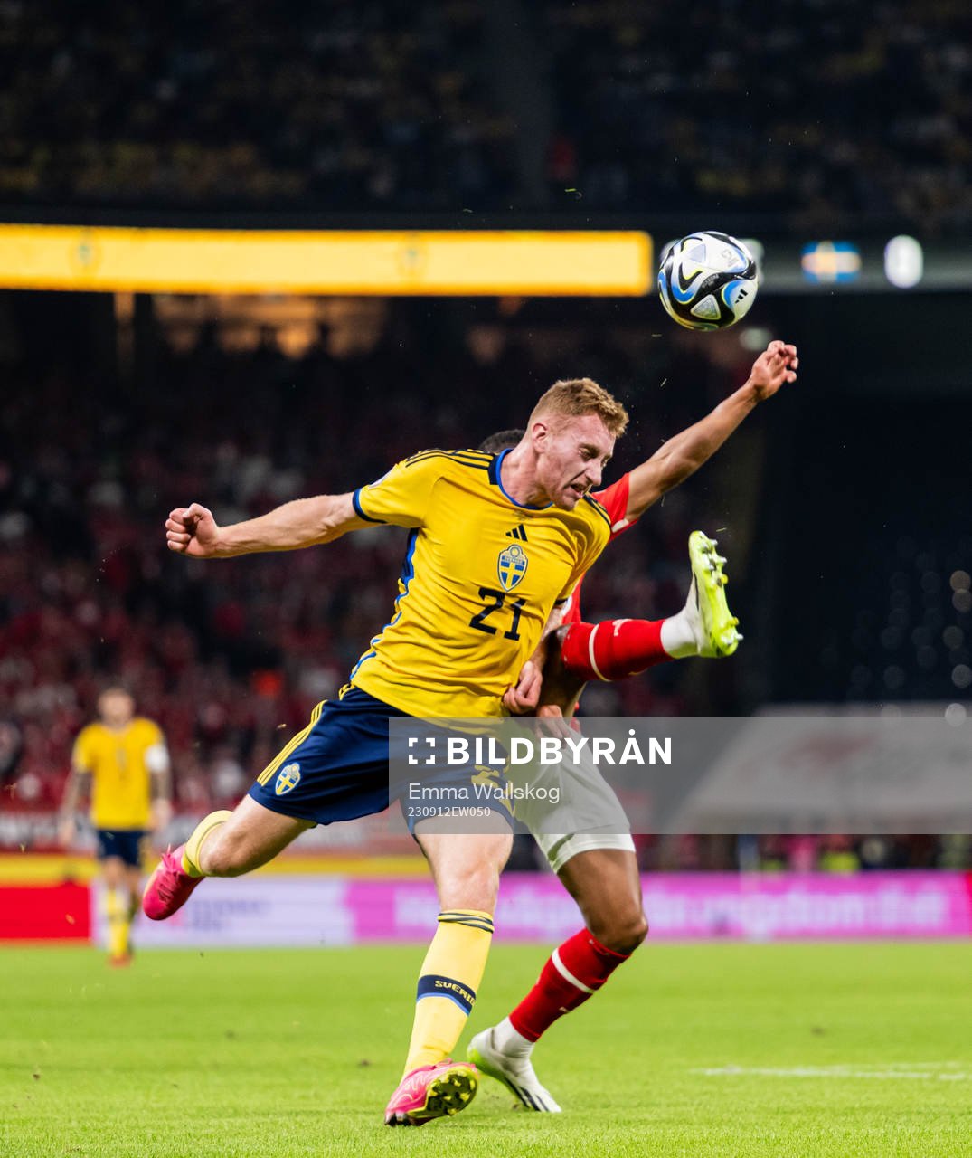Dejan Kulusevski of Sweden and Phillipp Mwene of Austria