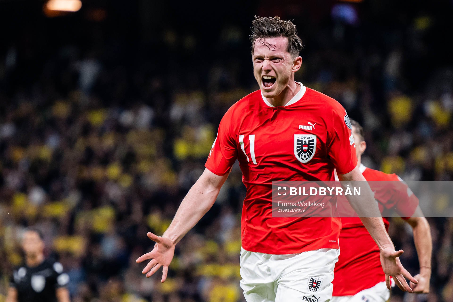 Michael Gregoritsch of Austria celebrates