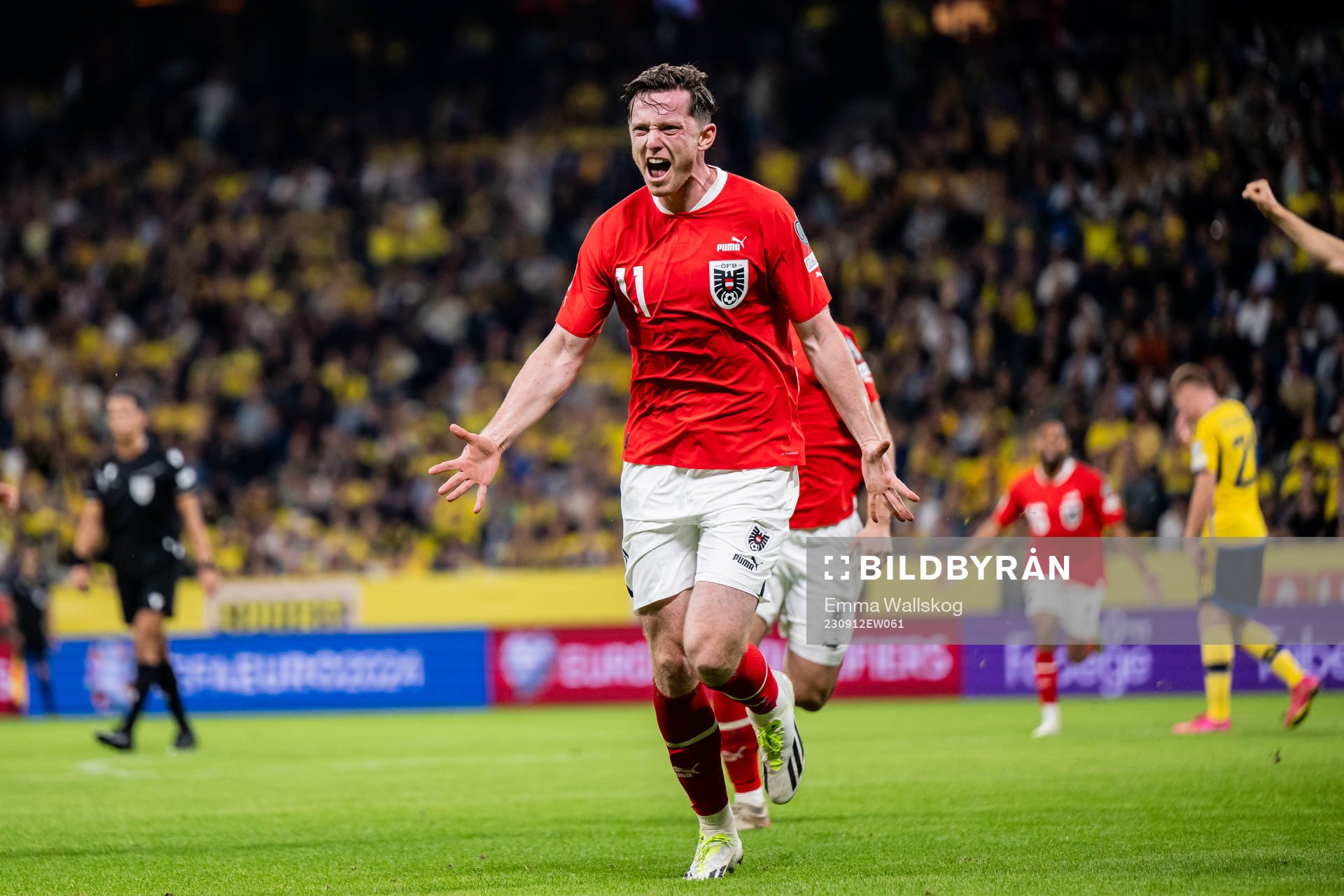 Michael Gregoritsch of Austria celebrates